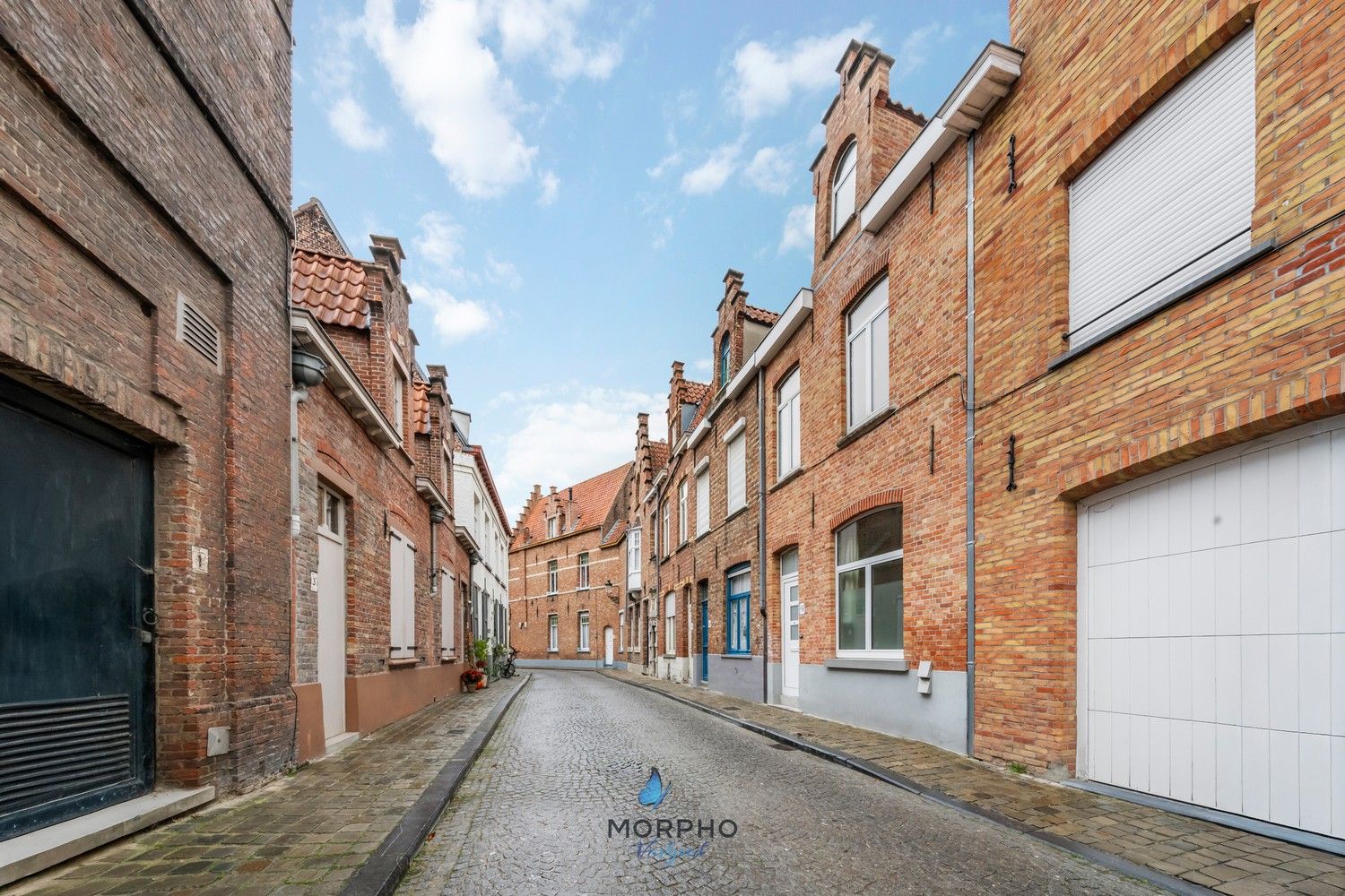 Te opfrissen rijwoning met 3 slpks en zonnige koer in centrum Brugge foto 7
