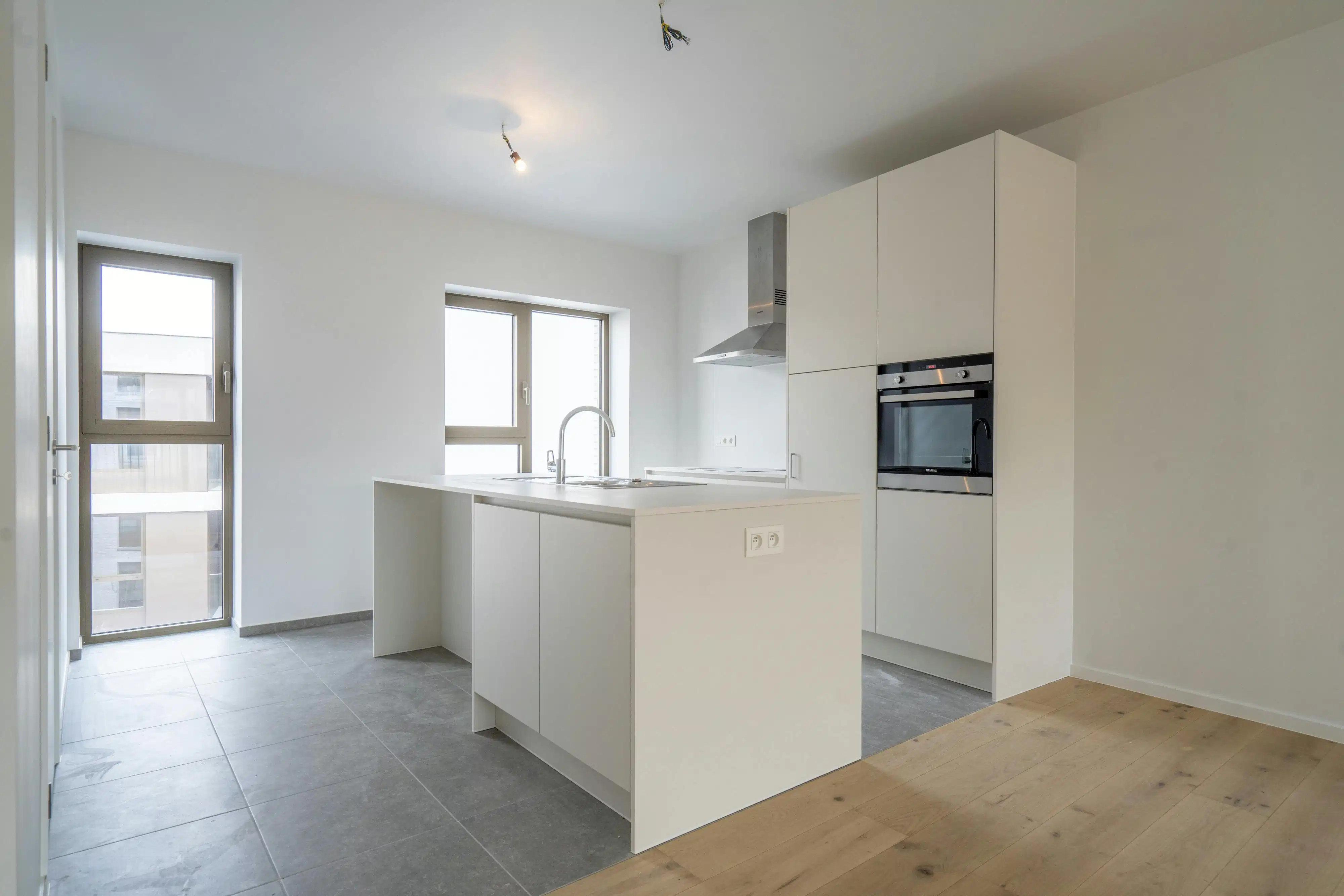 Kwalitatief tweeslaapkamerappartement in centrum Kortrijk! foto 5