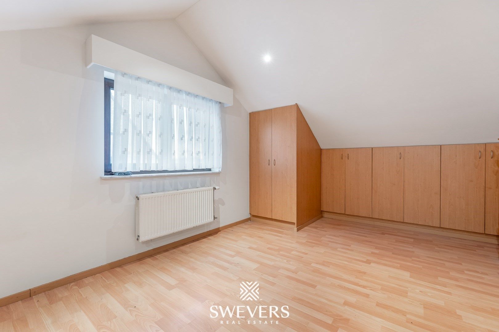 Instapklaar opbrengsteigendom met handelspand en 2 appartementen in Zonhoven foto 9