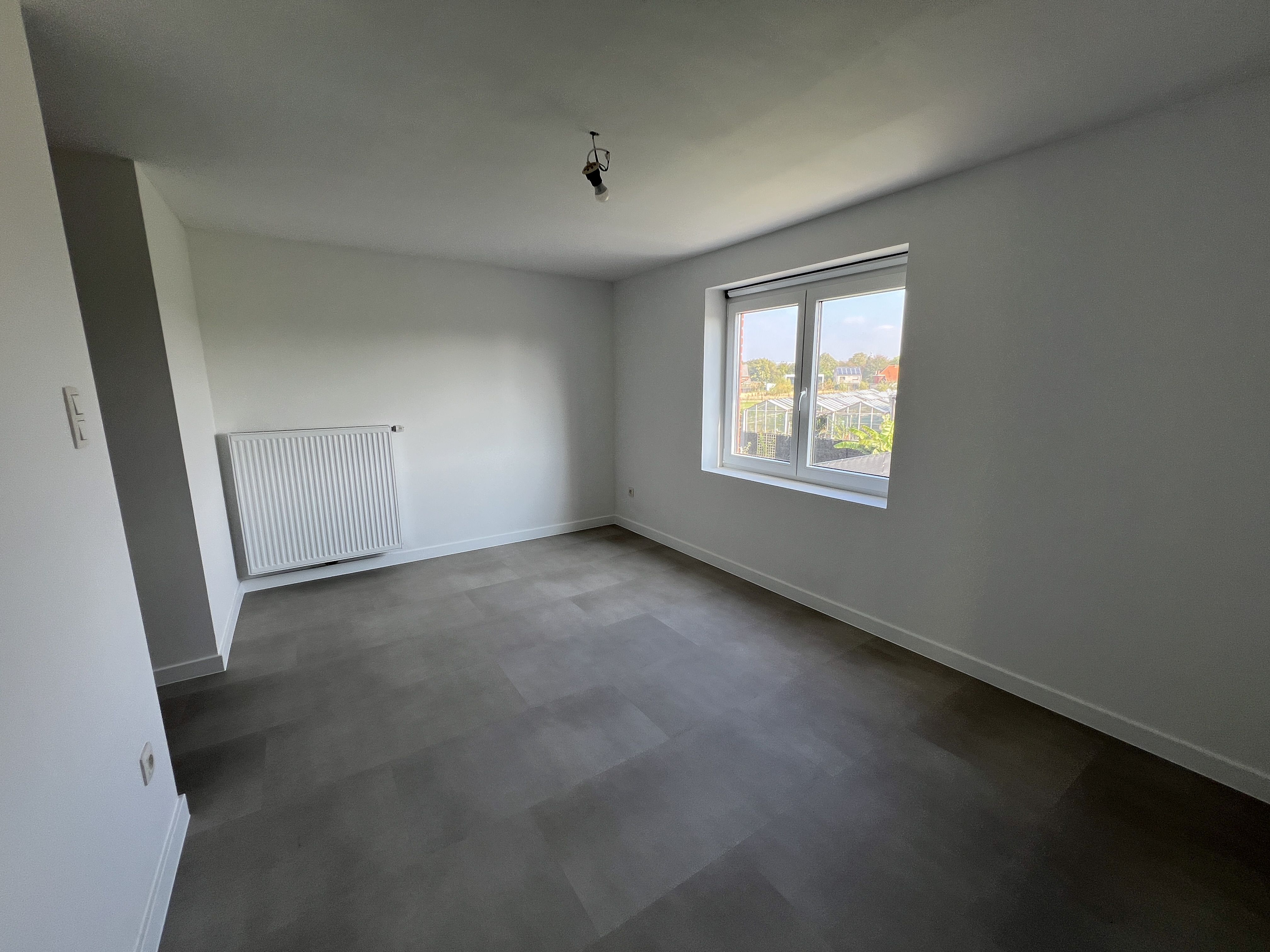 Volledig gerenoveerde energiezuinige driegevelwoning met 4 slaapkamers en tuin. foto 22