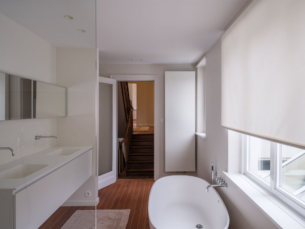 Omgeving Miljoenenkwartier - Bijzonder ruime herenwoning met tuin nabij het Paul de Smet de Naeyerpark. foto 15