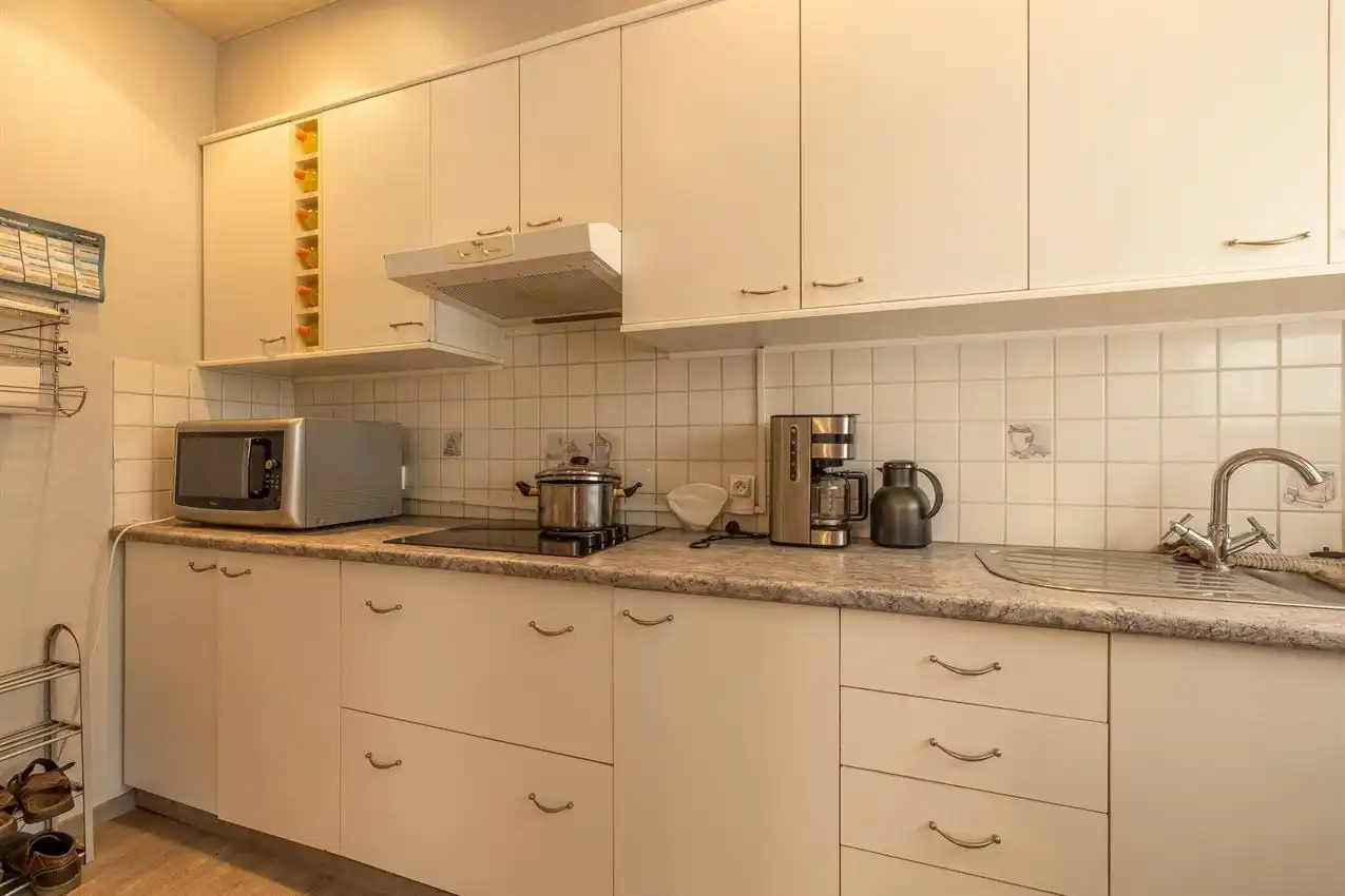 Verzorgde woning met 3slpk, inpandige garage en tuin foto 11