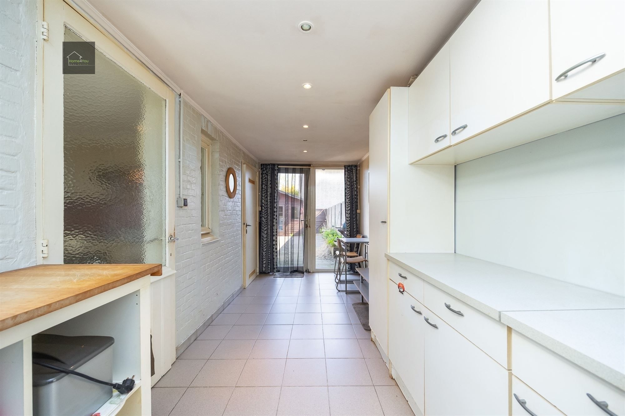 Te renoveren rijwoning met tuintje foto 6