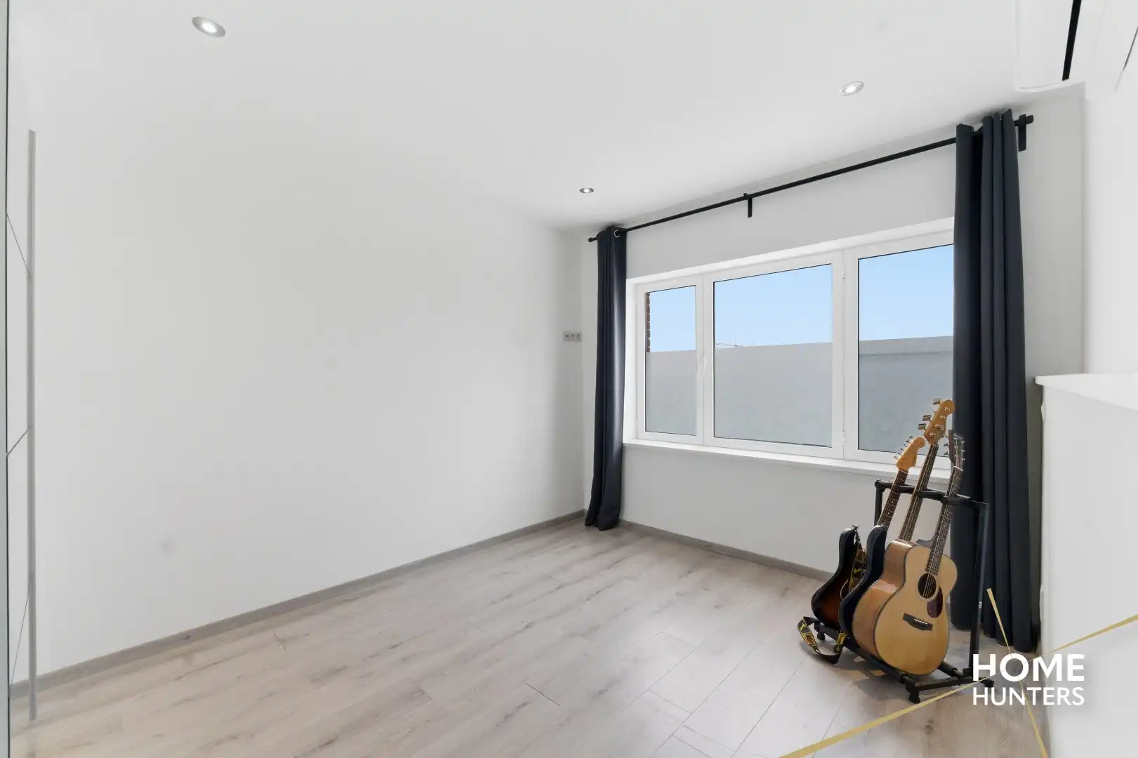 Instapklare woning met 3 slaapkamers op gunstige ligging te Ieper! foto 12