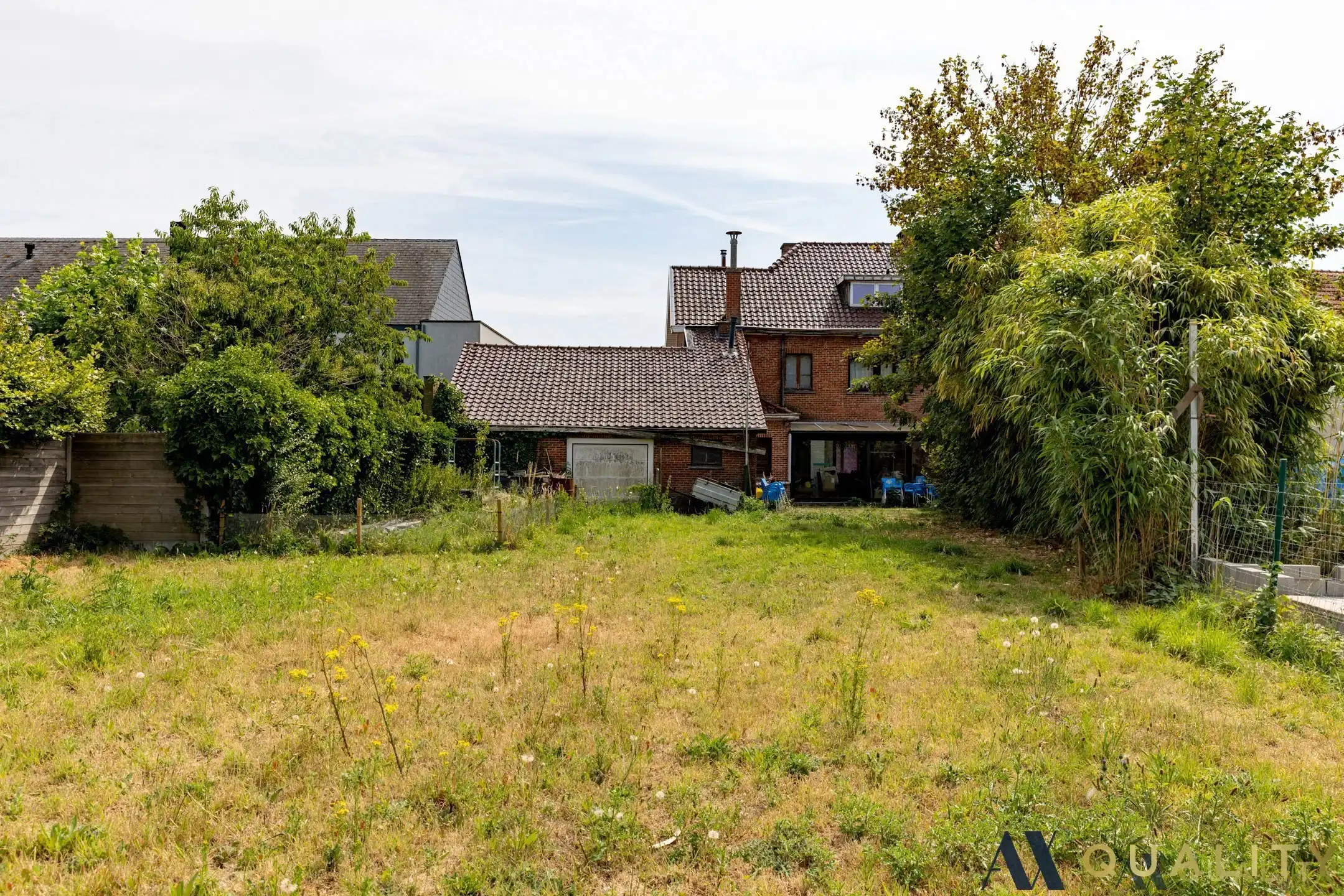 Te renoveren gesloten bebouwing met garage, ruime tuin en groenzicht in Oppuurs foto 10
