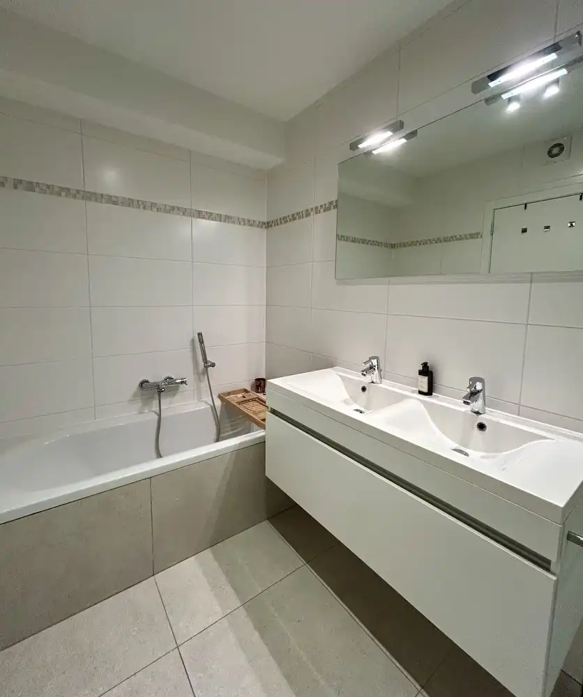 Instapklaar gelijkvloers appartement met privatieve tuin en garage in hartje Kessel-Lo foto 12