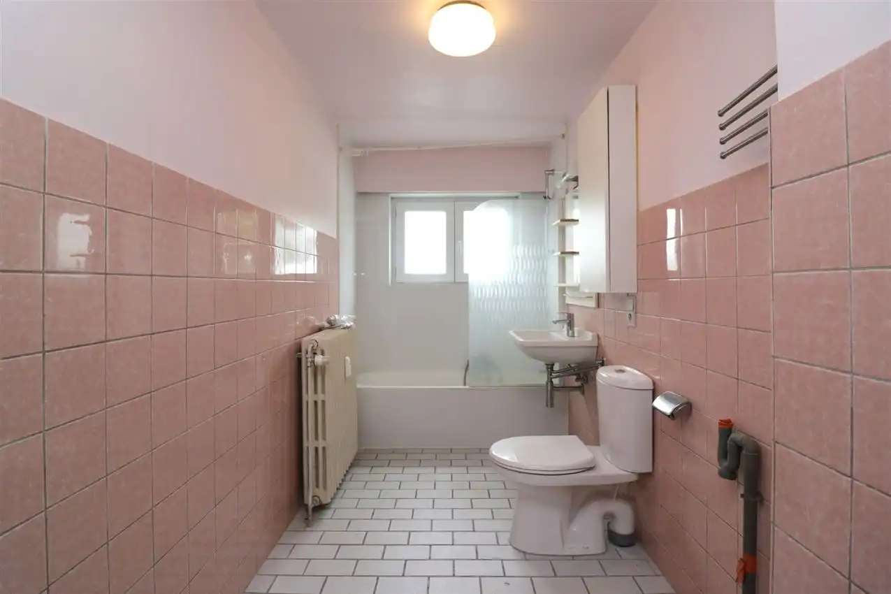 Opbrengsteigendom (handel & 4 app) op toplocatie foto 114