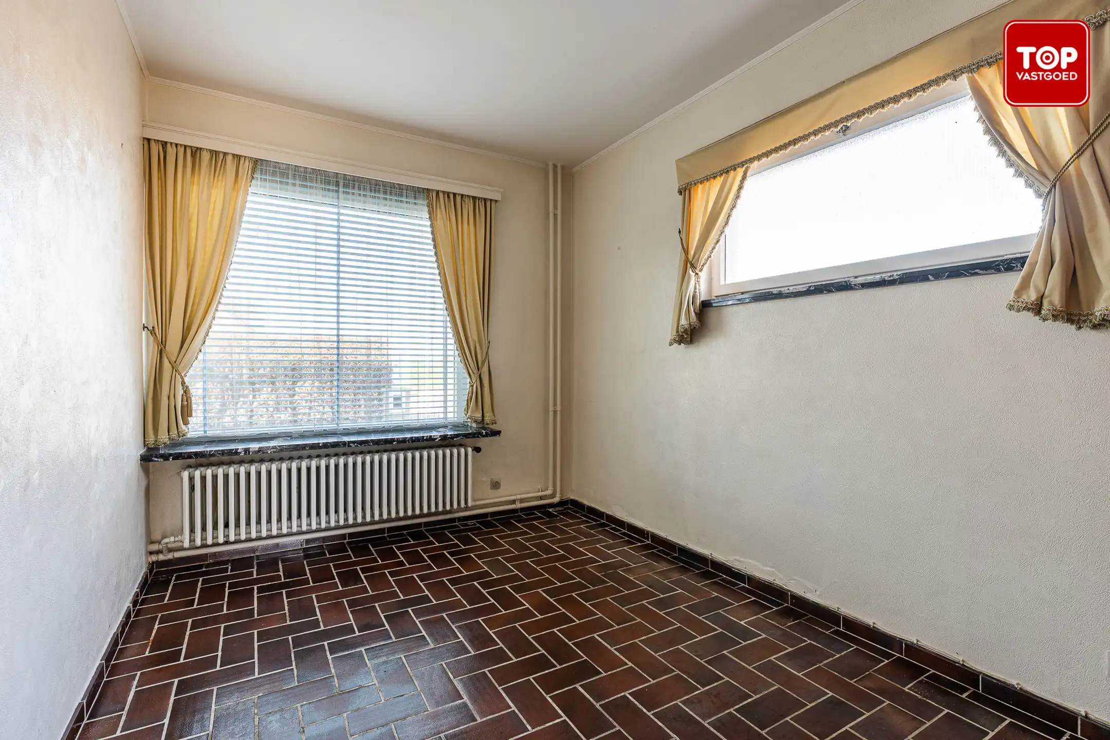 Ruime woning met uitzonderlijk potentieel op rustig gelegen perceel foto 3