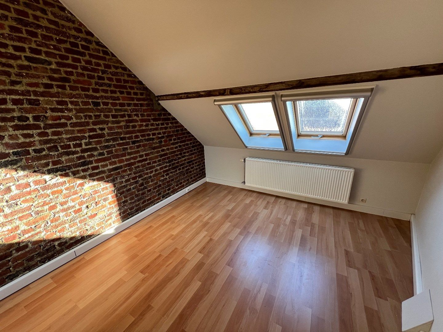 Gezellige rijwoning met 1 slaapkamer (+ bureau) en terras (2 slpks mogelijk) foto 8