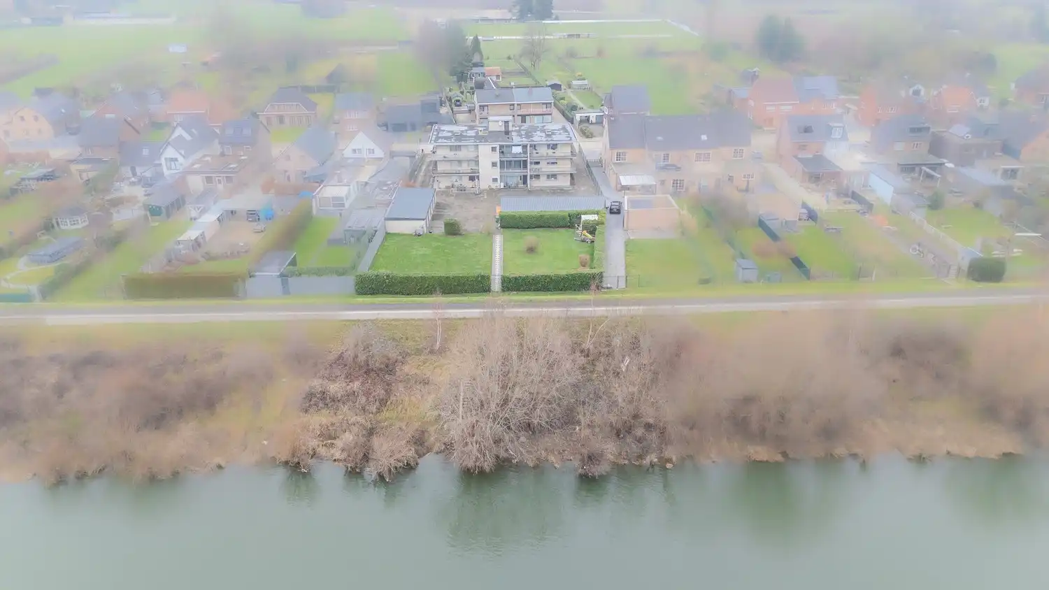 Gelijkvloers appartement met 3 slaapkamers, terras en garage in Uikhoven aan de Maas! foto 25