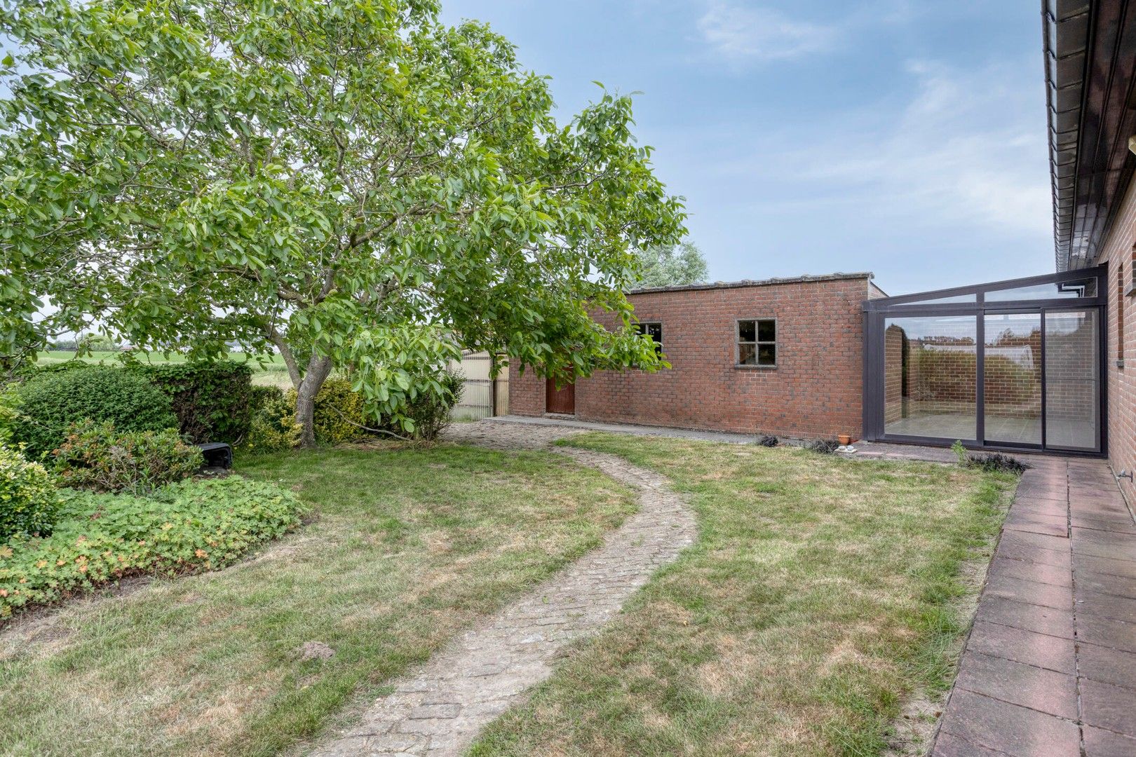 Alleenstaande woning met grote tuin en weiland op 3.846 m² foto 19