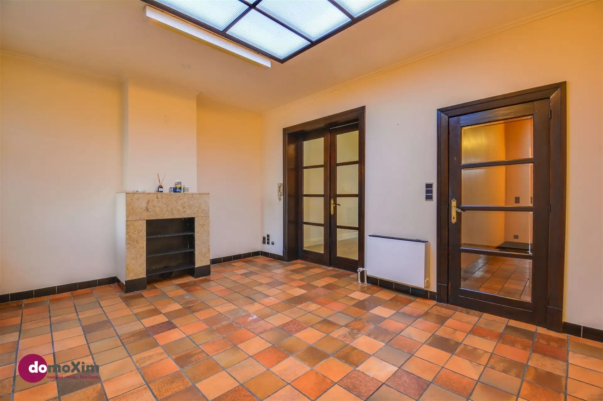 Ruime, karaktervolle stadswoning met twee garageboxen en tuin in Mechelen foto 7