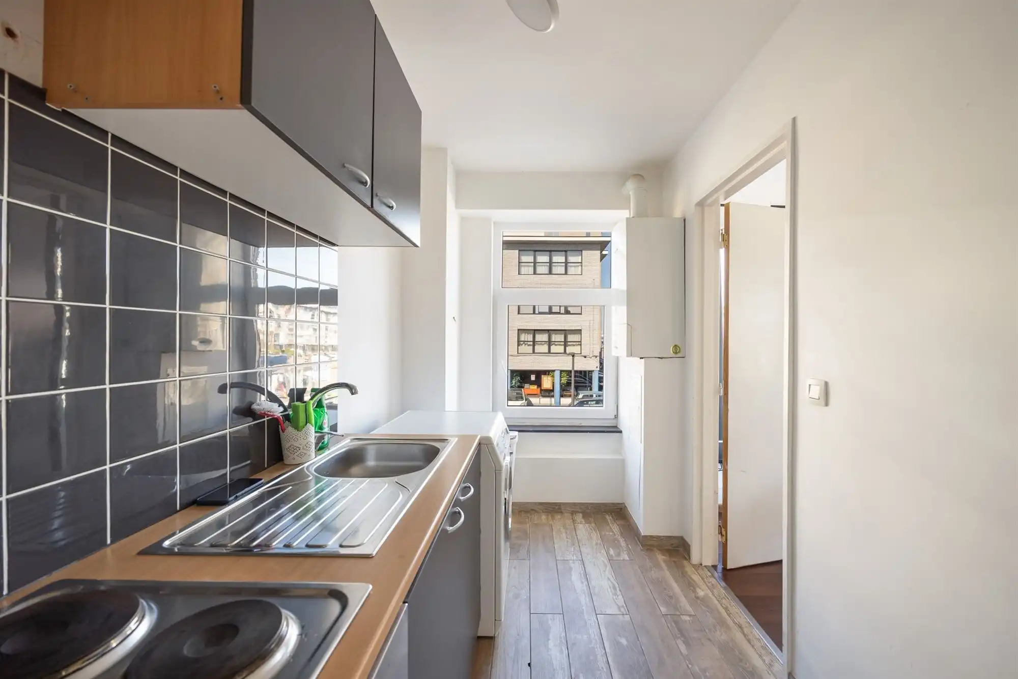 Lichtrijk hoekappartement met 1 slaapkamer foto 4