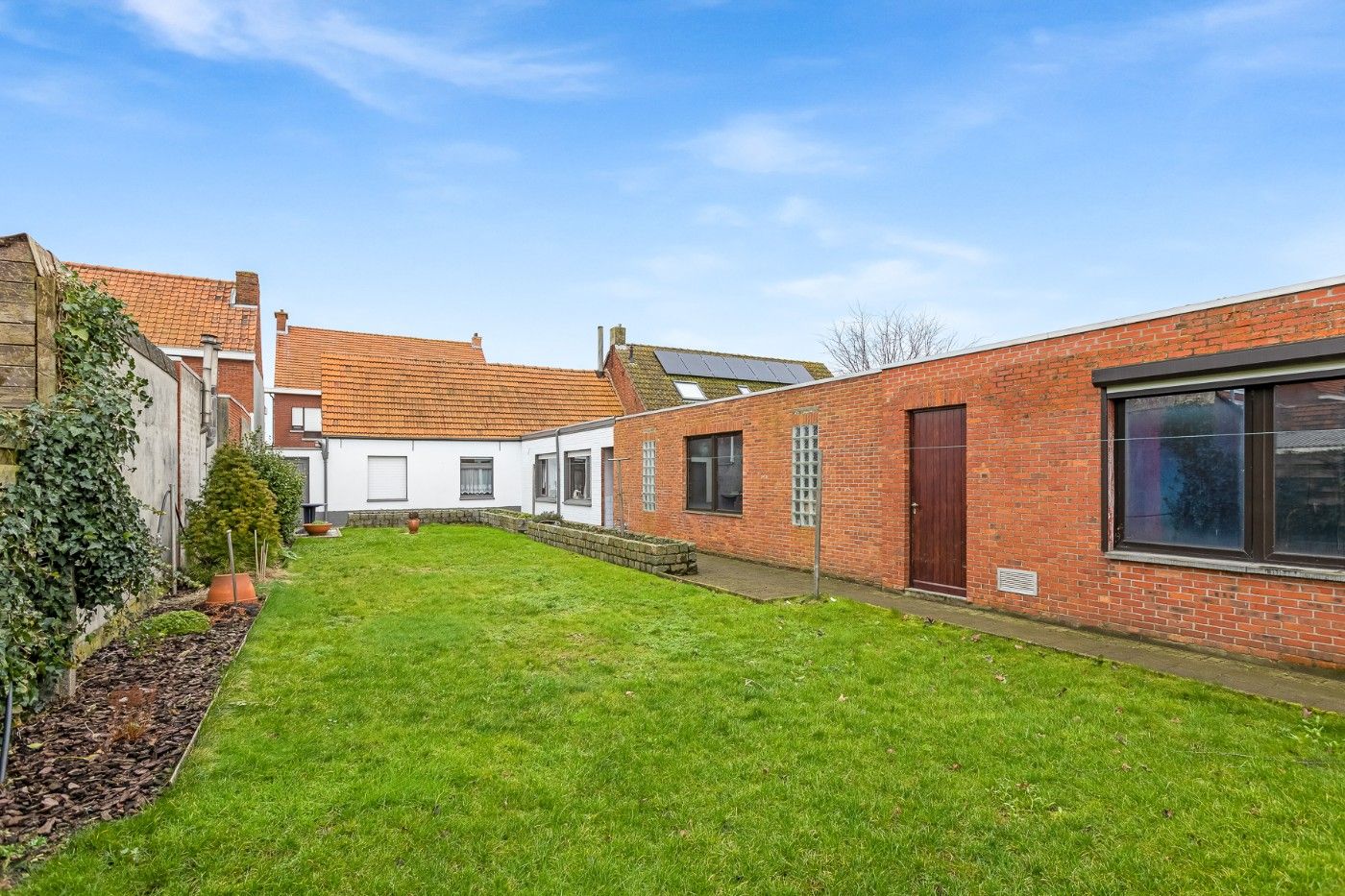 Rustig gelegen woning met 2 slpk., atelier, tuin en dubbele garagebox foto 24