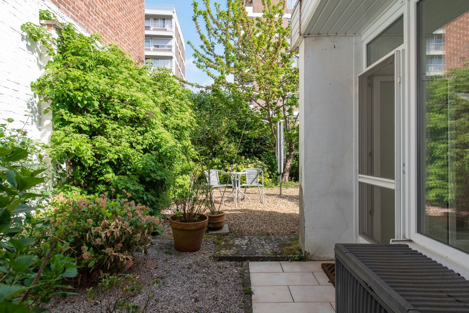 Gelijkvloers 1 slaapkamer-appartement met eigen stadstuin in hartje Genk foto 23