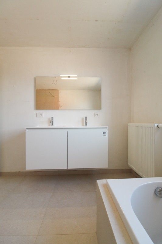 Halfopen nieuwbouwwoning met garage Roeselare foto 13