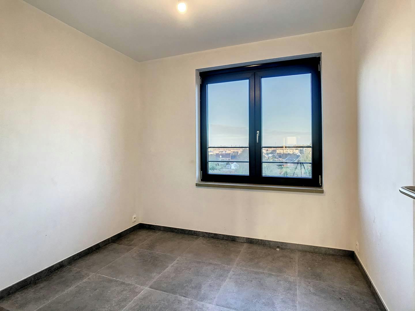 Gerenoveerd, energiezuinig appartement met 3 slaapkamers in Ieper  foto 13