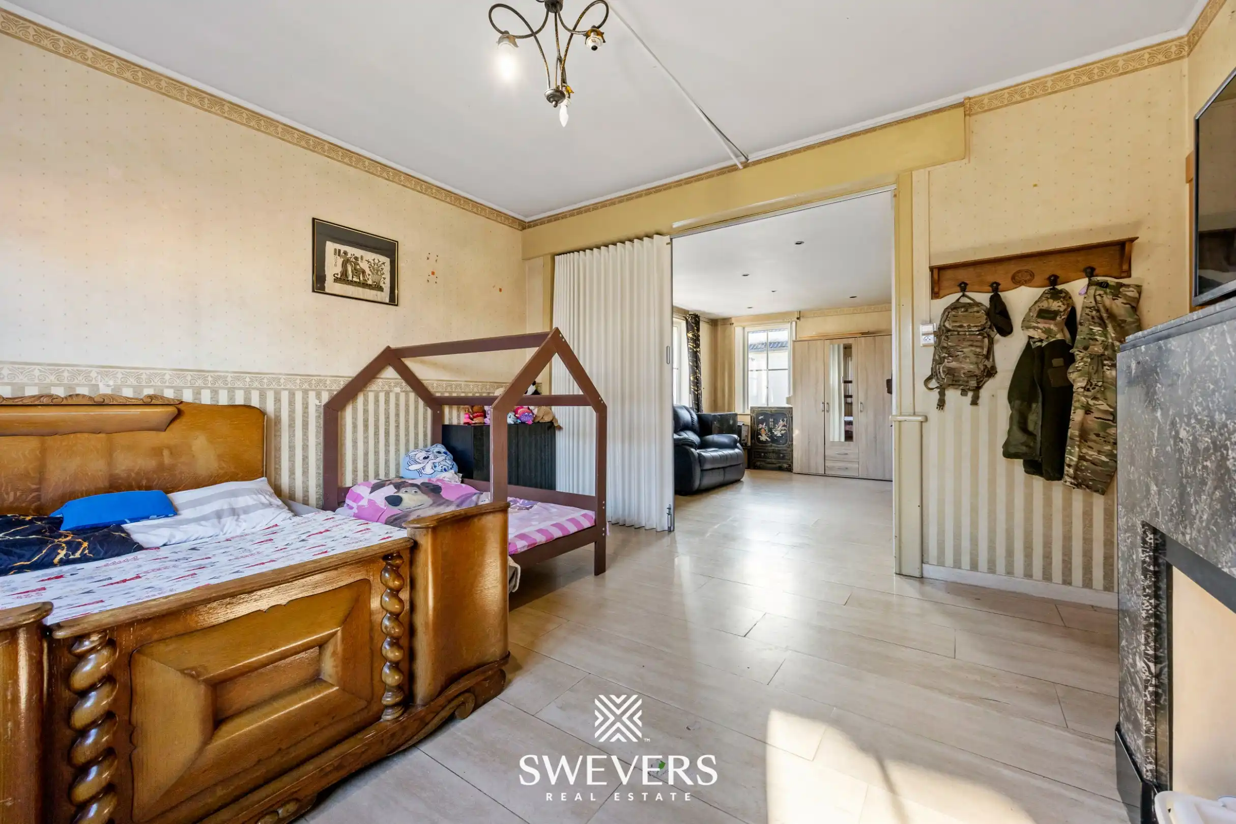 Te renoveren open bebouwing met ruime volumes en zuidgericht perceel in Heusden   foto 14