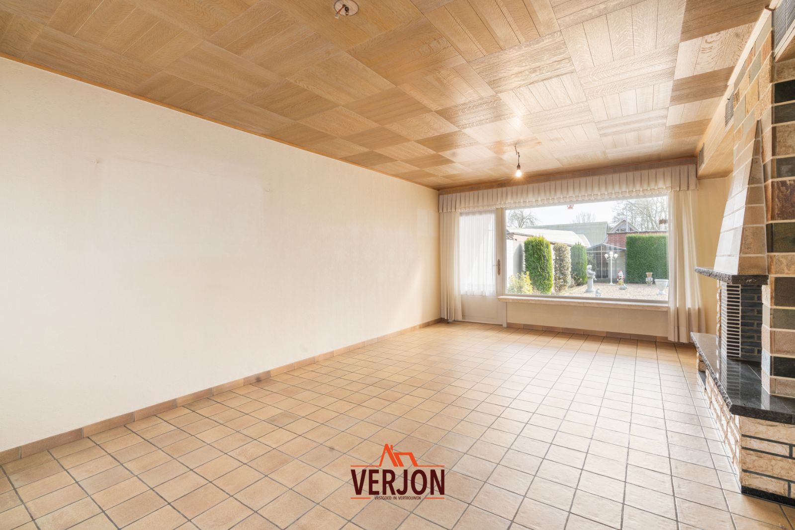 Woning met zuidgerichte tuin te koop in Kachtem! foto 4