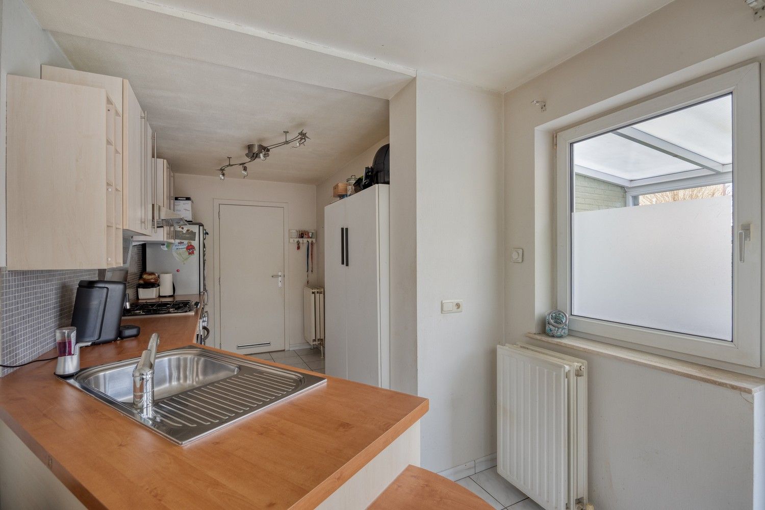 Rustig gelegen halfopen bebouwing met 3 slaapkamers, veranda en garage in Houthalen-Helchteren foto 14