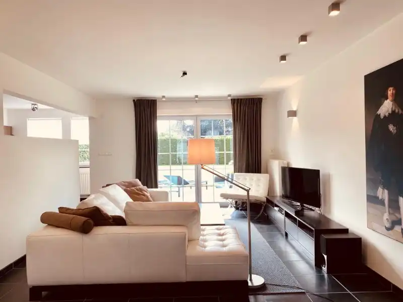 Prachtig afgewerkte 3 slpk-woning in een rustige woonwijk foto 8