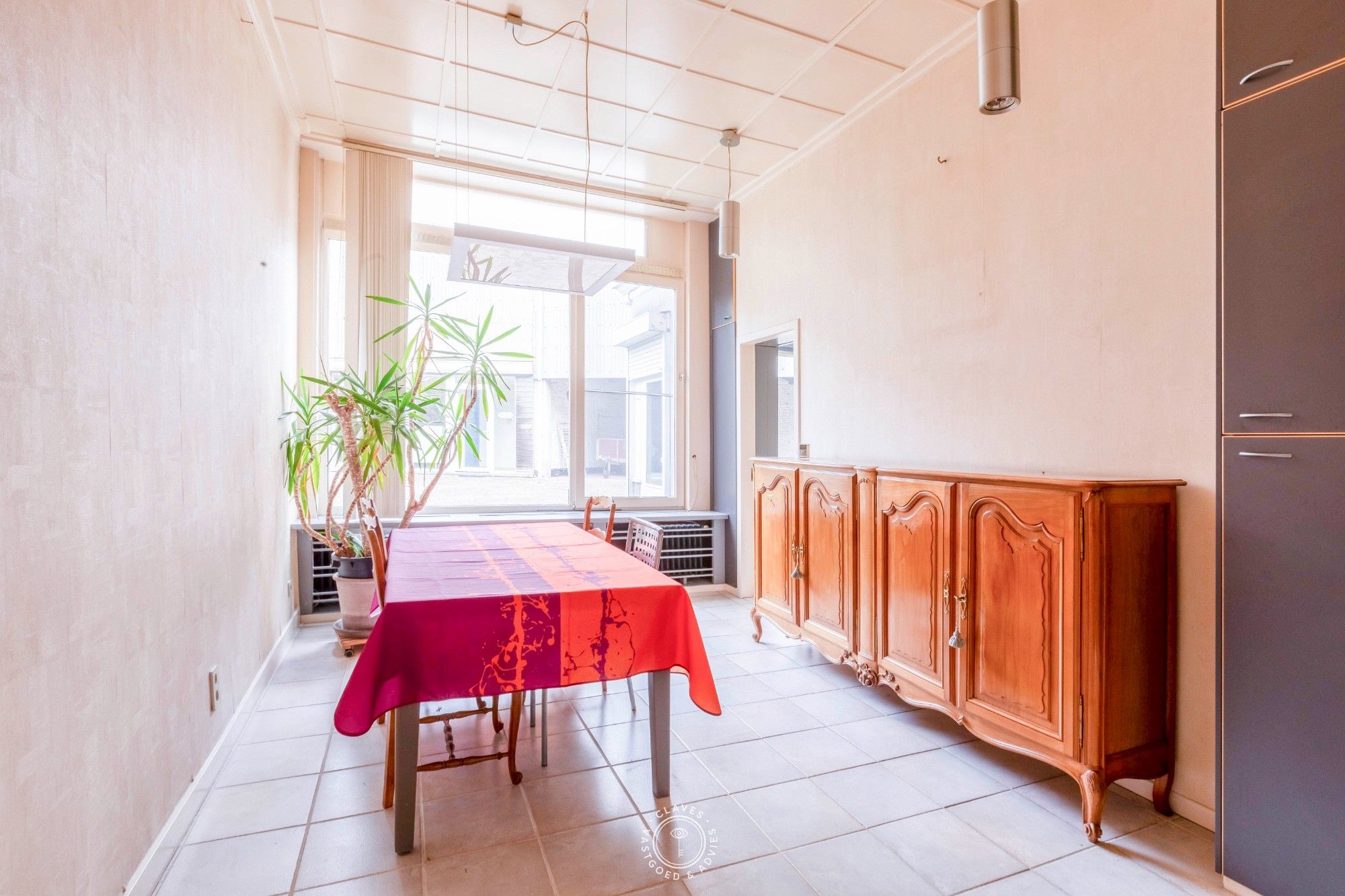 Magazijn met bovenverdieping, praktijkruimte én karaktervol herenhuis op strategische locatie foto 19