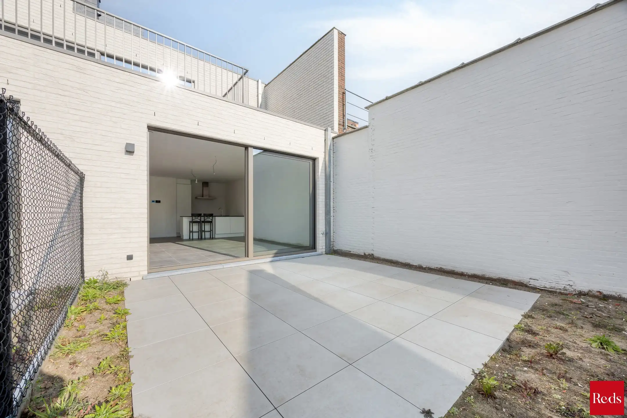 Stijlvol gelijkvloers appartement met tuin foto 18