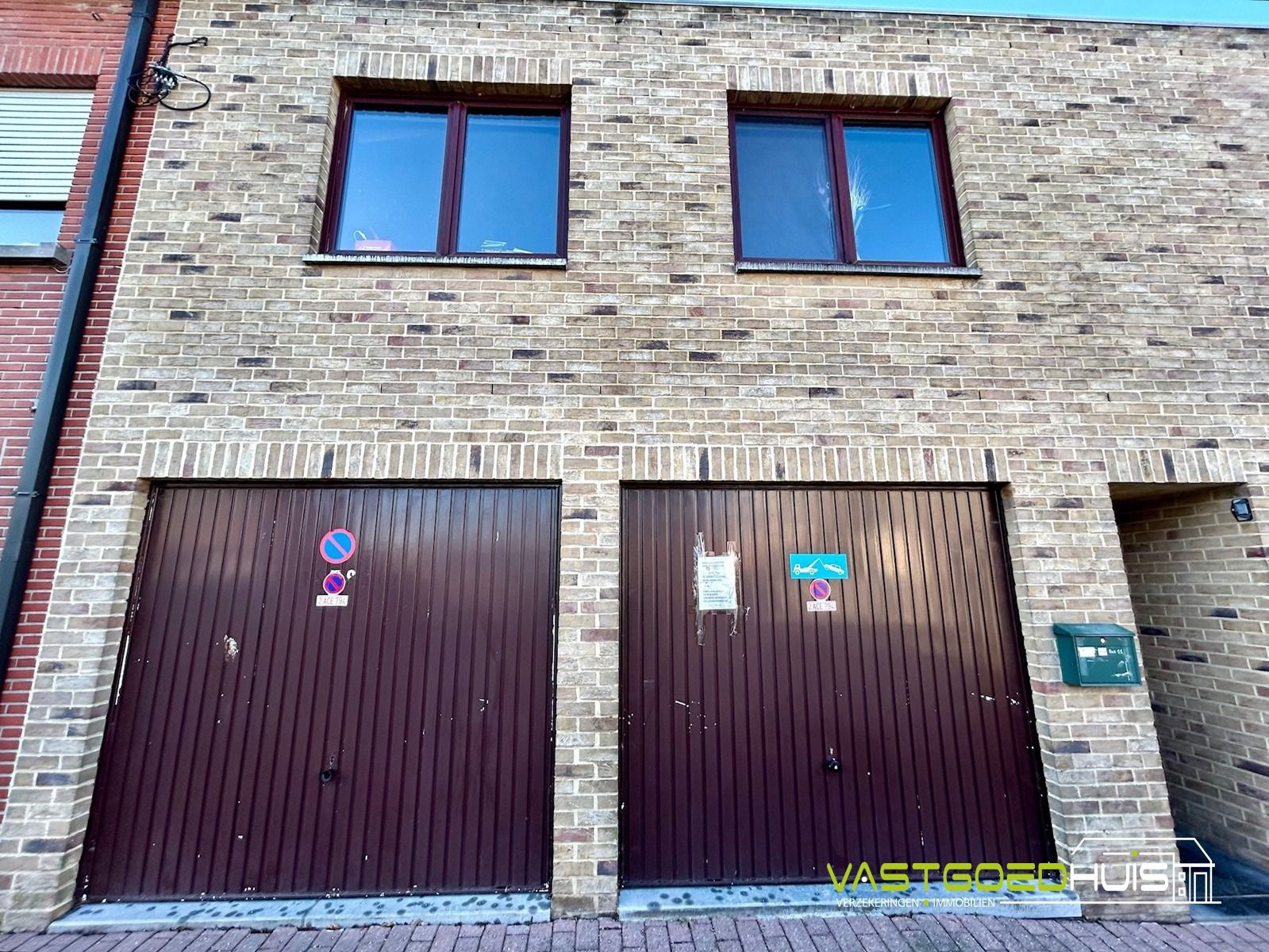 Opbrengsteigendom: handelspand, 2 appartementen en 2 garages foto 4