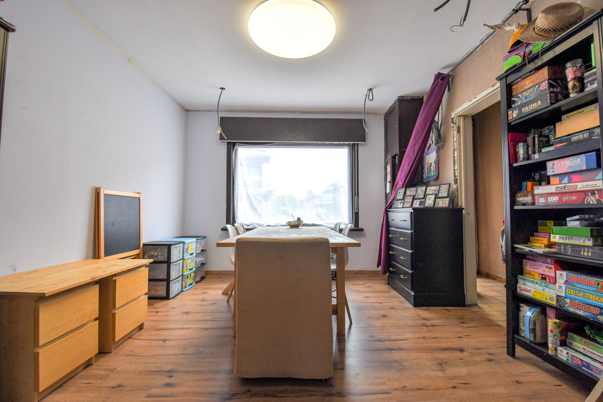 Gezinswoning met 3 slaapkamers, diepe tuin en enorm veel potentieel. foto 7