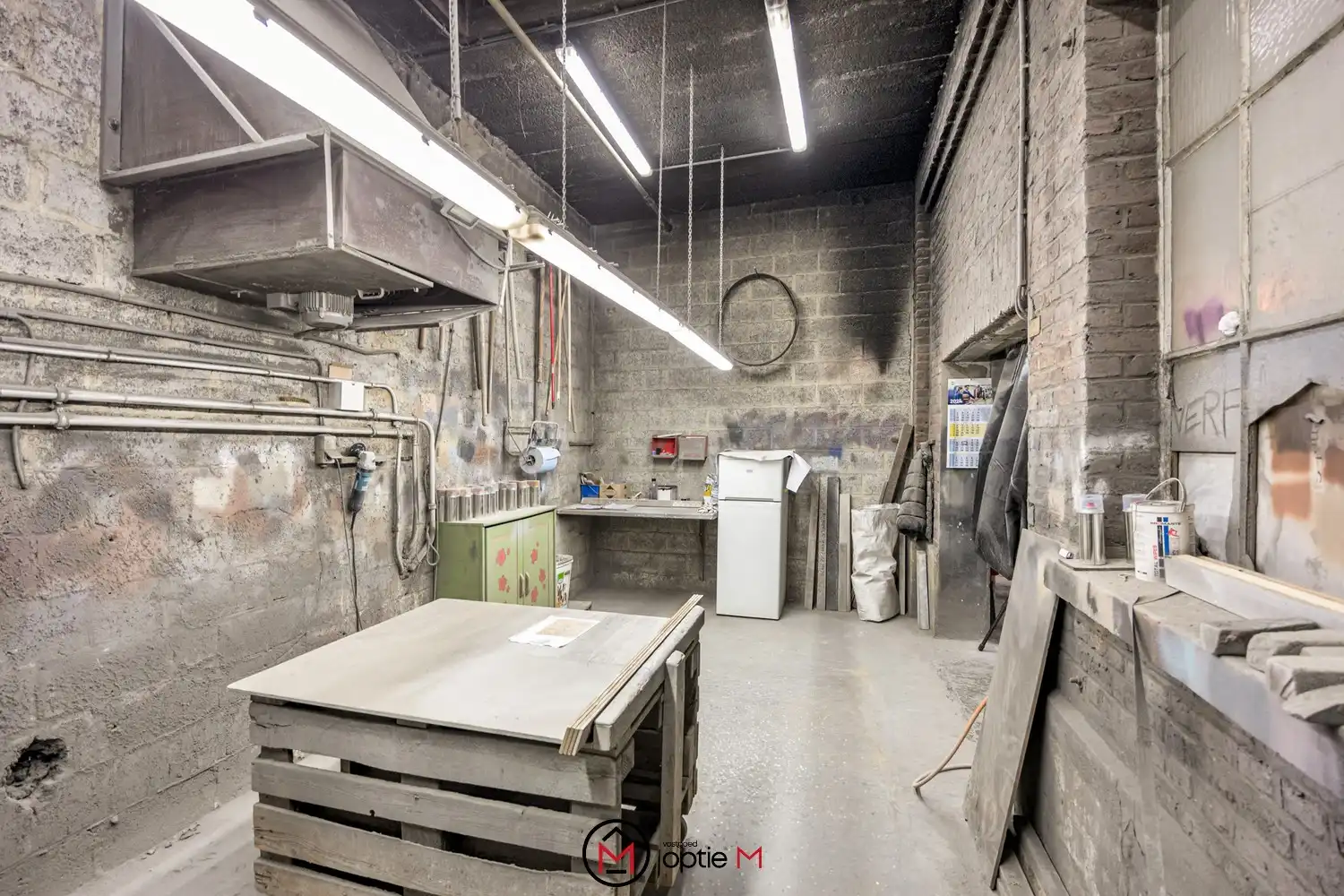 Werkplaats met loods en kantoor te koop in Bilzen foto 4