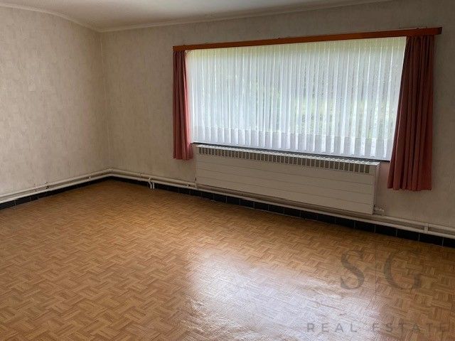 Te renoveren vrijstaande woning op ruim perceel tussen Bocholt en Bree – rust en potentieel op meer dan 32 are foto 15