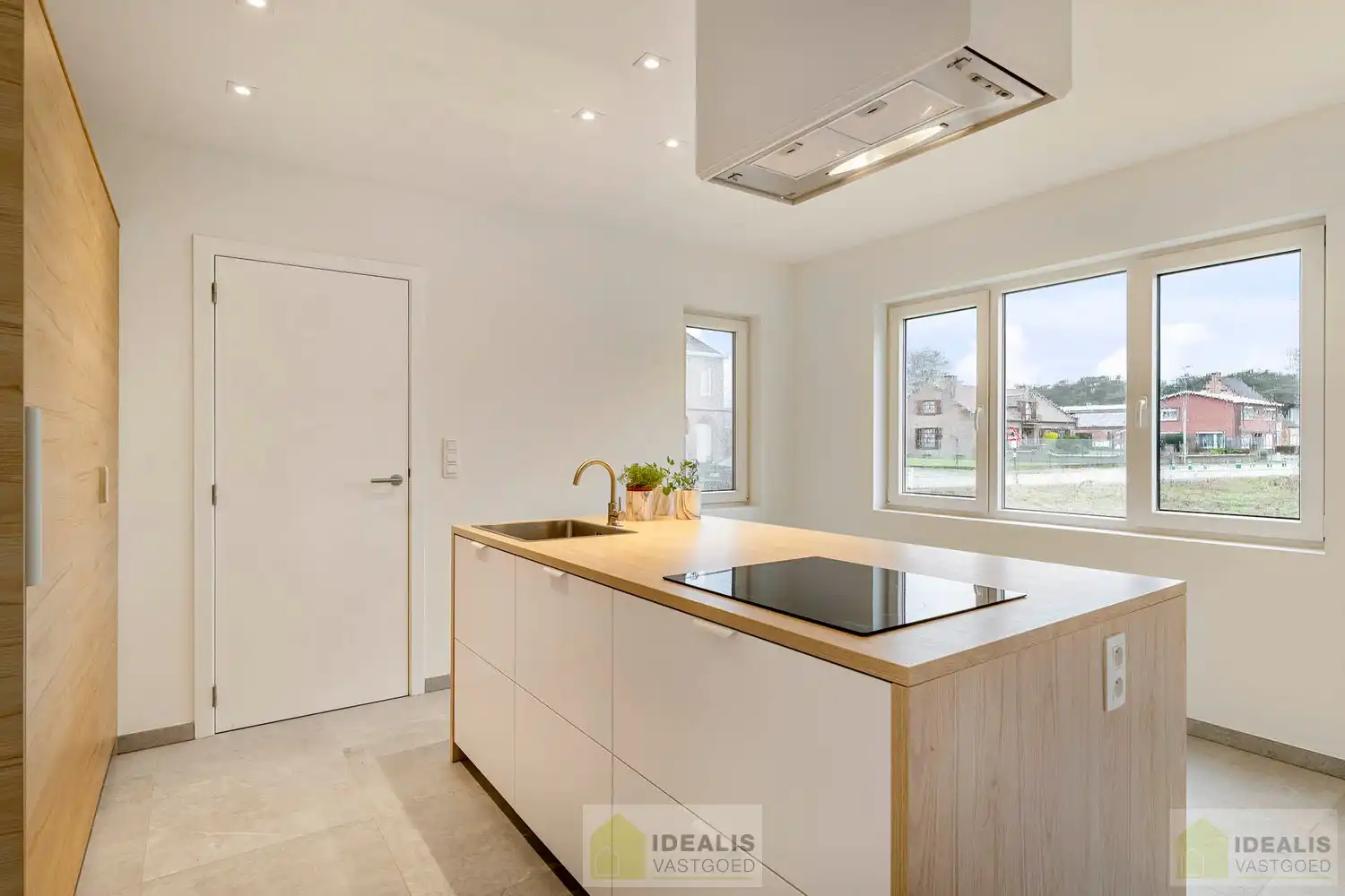 IDEALIS VASTGOED – Schitterend volledig vernieuwde woning met een heerlijke open leefruimte, luxe keuken, 3 ruime slaapkamers, twee badkamers én een ruime wasplaats! Dit heerlijke huis bevindt zich op een perceel van maar liefst 7a 94ca vlak bij het centrum van Eksel - EEN MUST VISIT! - foto 7