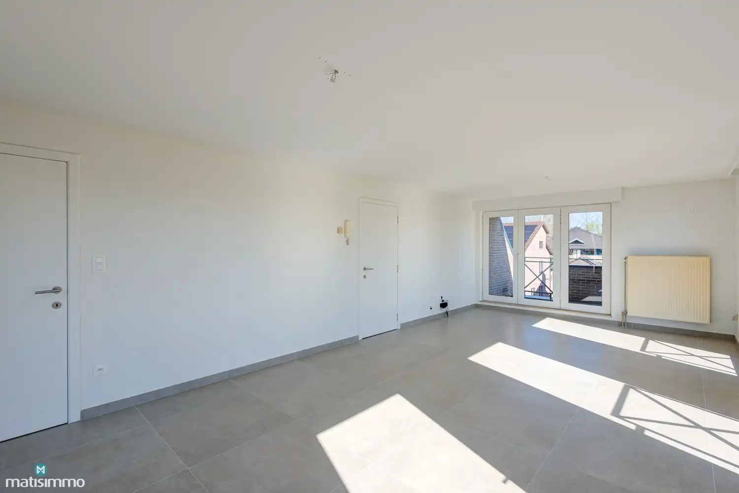 INSTAPKLAAR DUPLEX-APPARTEMENT MET 2 SLAAPKAMERS EN GARAGE NABIJ HET CENTRUM VAN BILZEN foto 4