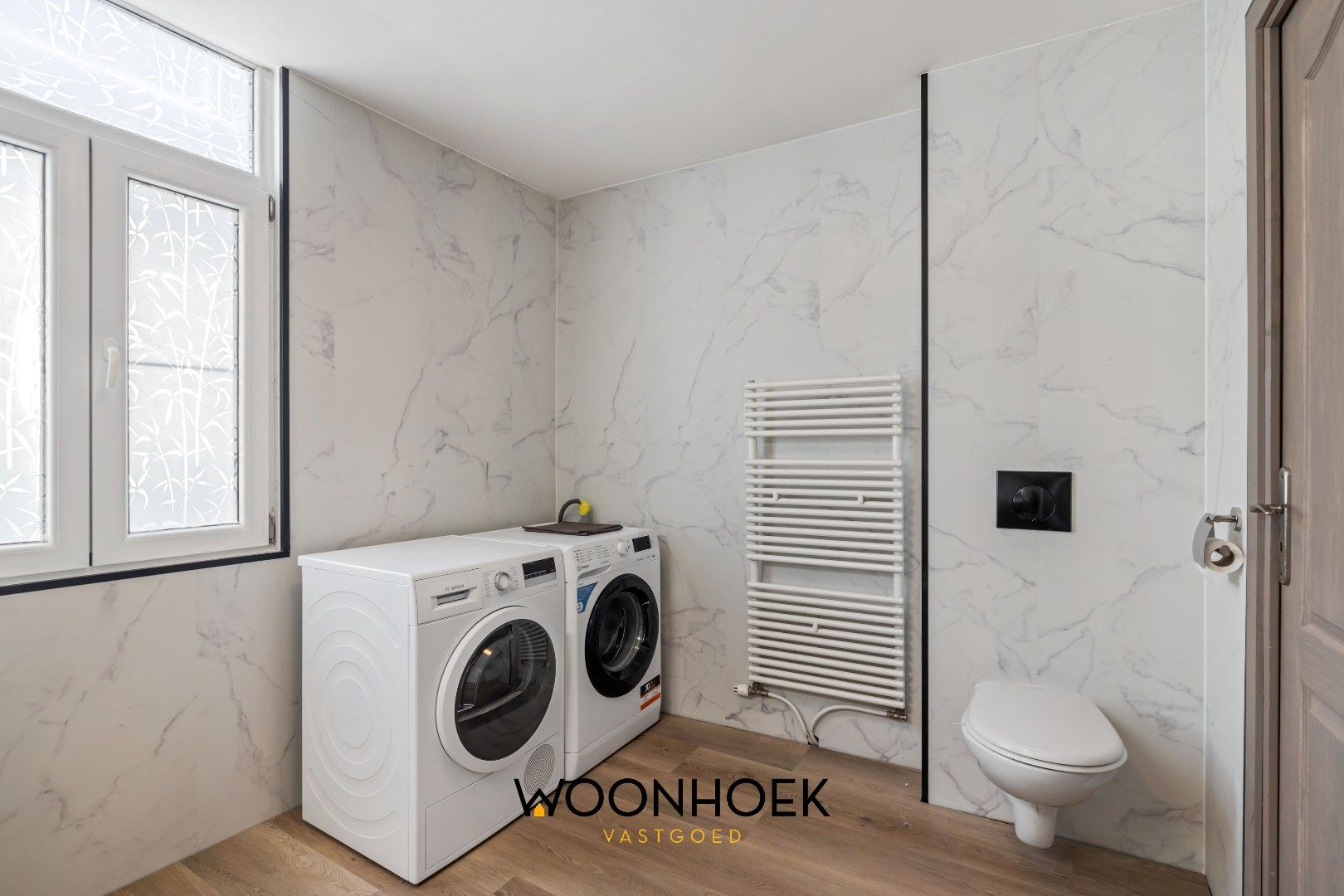 Ruime woning in centrum Waasmunster  foto 11