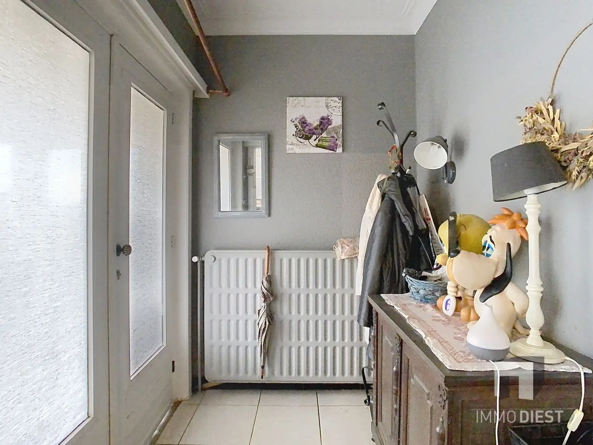 Charmante, op te frissen woning met ruime tuin nabij het centrum van Herselt. foto 5