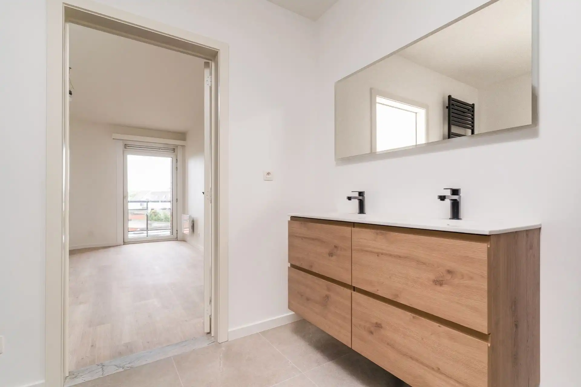 Lichtrijk 3 slpk appartement met balkon en autostaanplaats foto 11