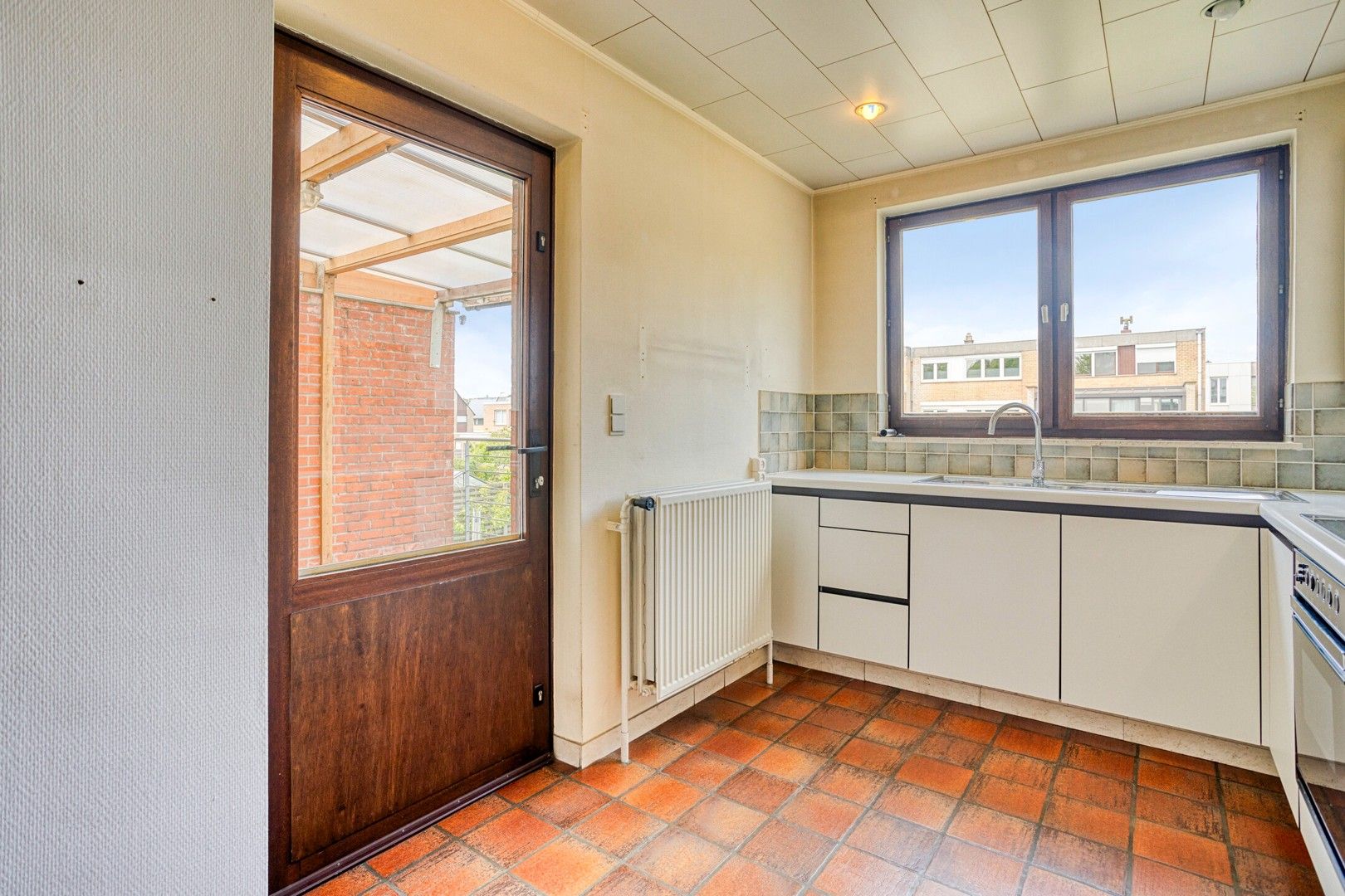 Op te frissen woning met kantoorruimte en garage te Sint-Michiels foto 12