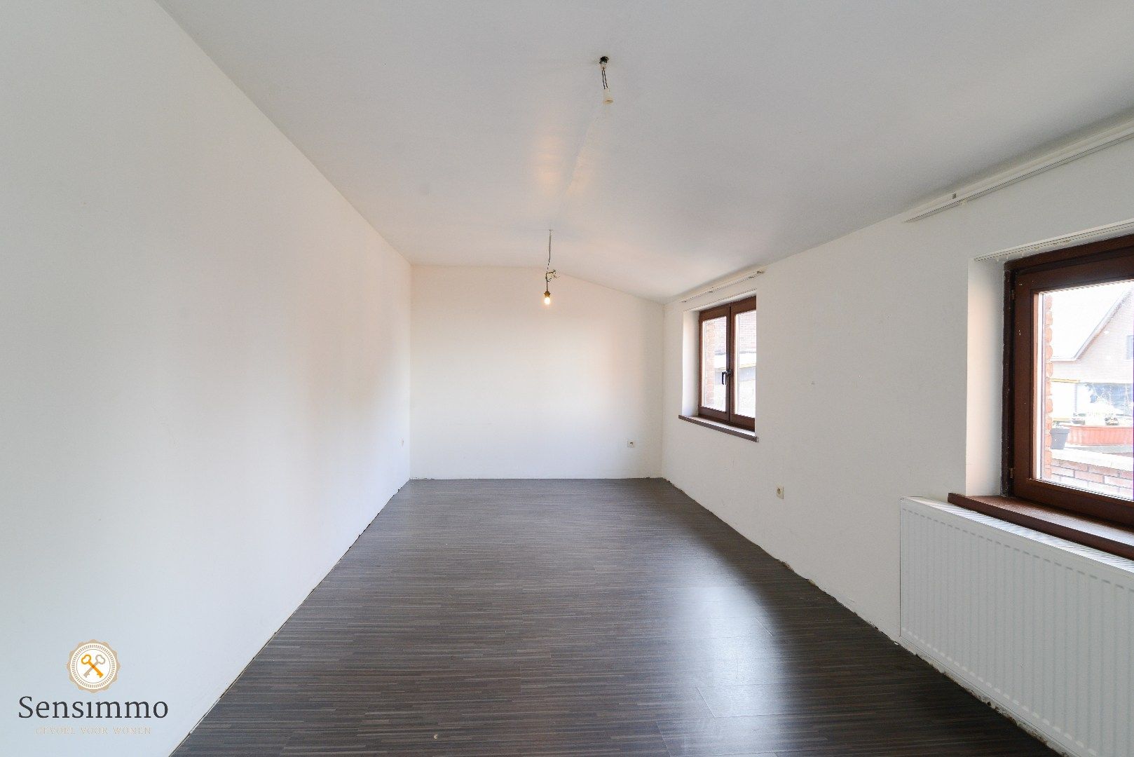 Prachtig gelegen duplex met 2 slpkmrs + terras + parking foto 3