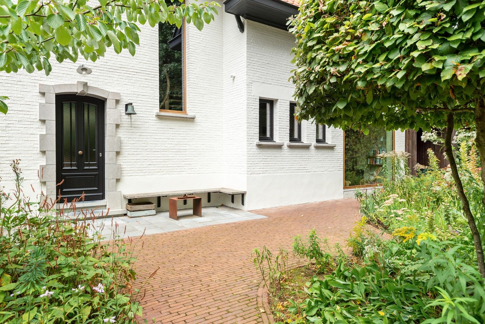 Stijlvolle, vrijstaande villa met zonnige tuin en zwemvijver foto 29