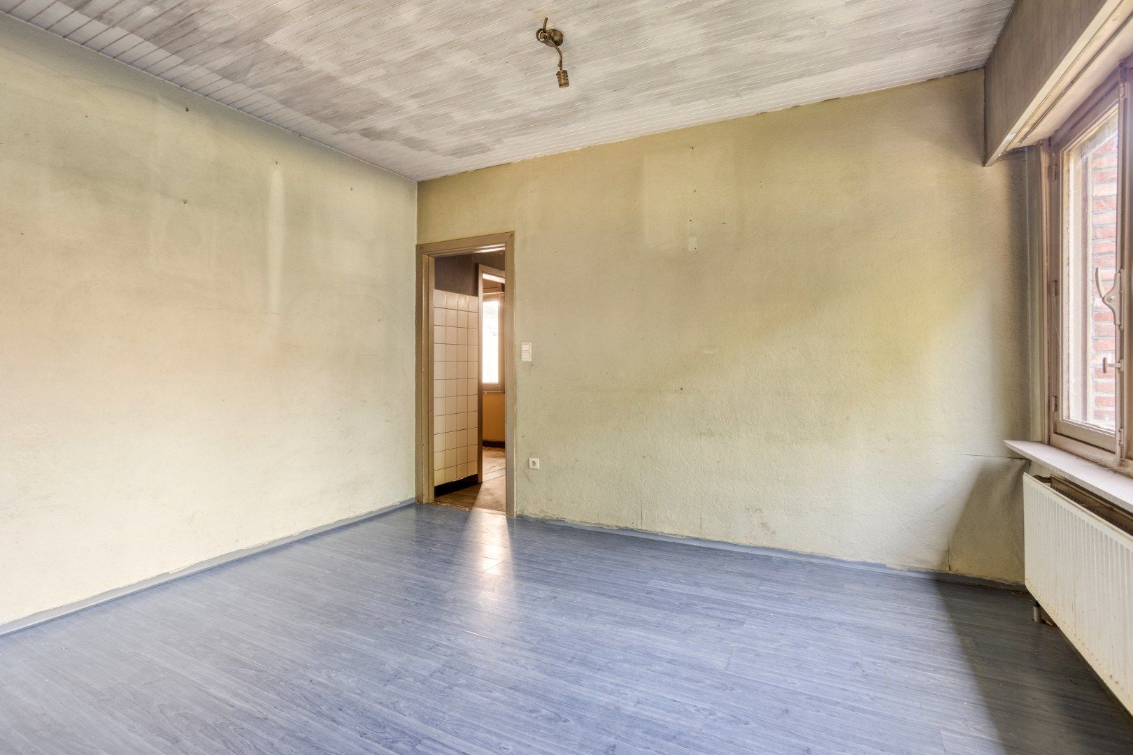 Te renoveren woning, rustig en landelijk gelegen op 1.265 m² nabij het centrum ! foto 4