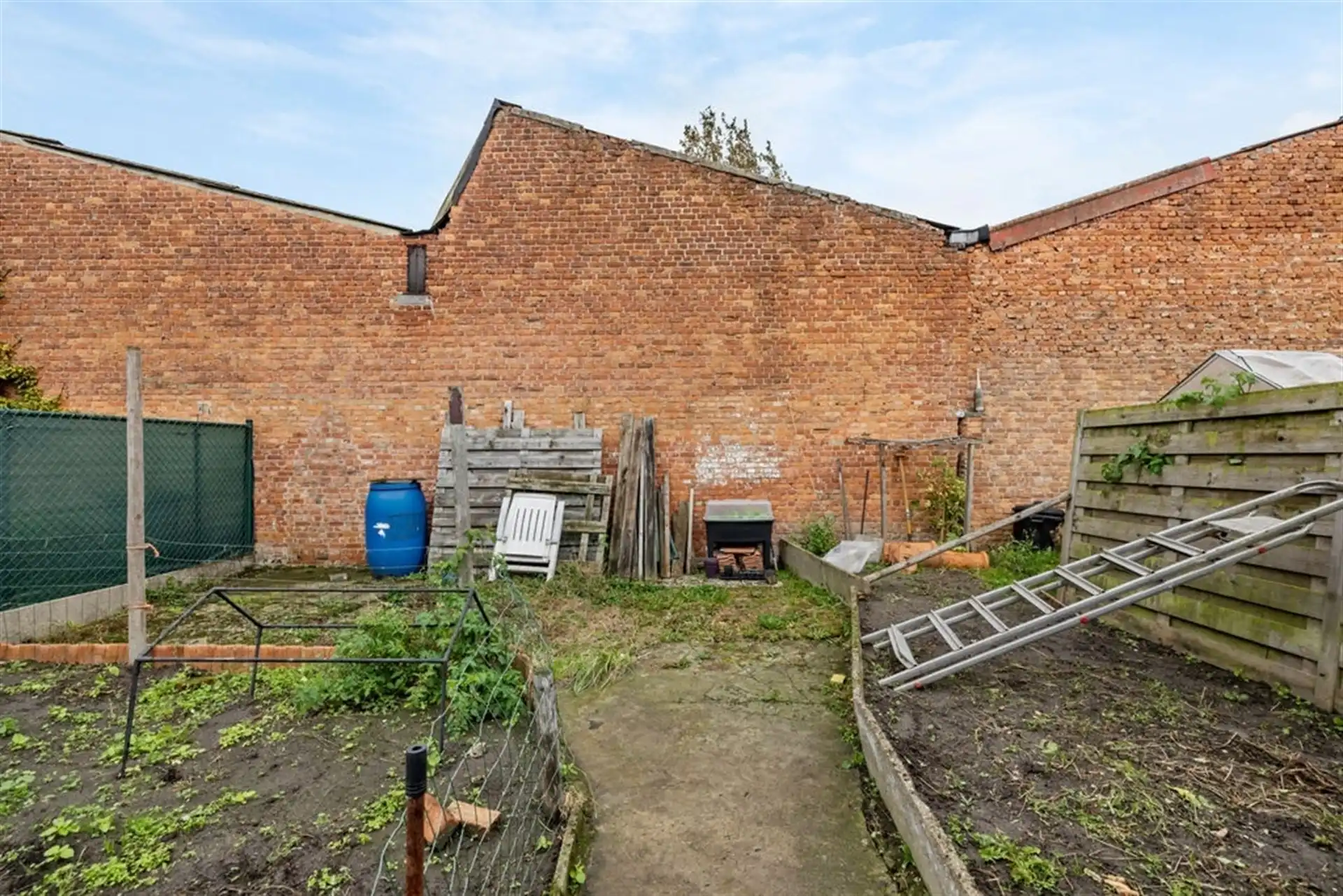 Potentiële gezinswoning of 2 bouwgronden in het hartje van Sint-Gillis-Waas foto 27