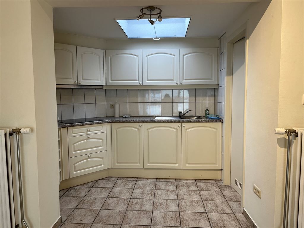 Gezellig en instapklaar triplex appartement met 2 slaapkamers in het centrum van Opoeteren foto 5