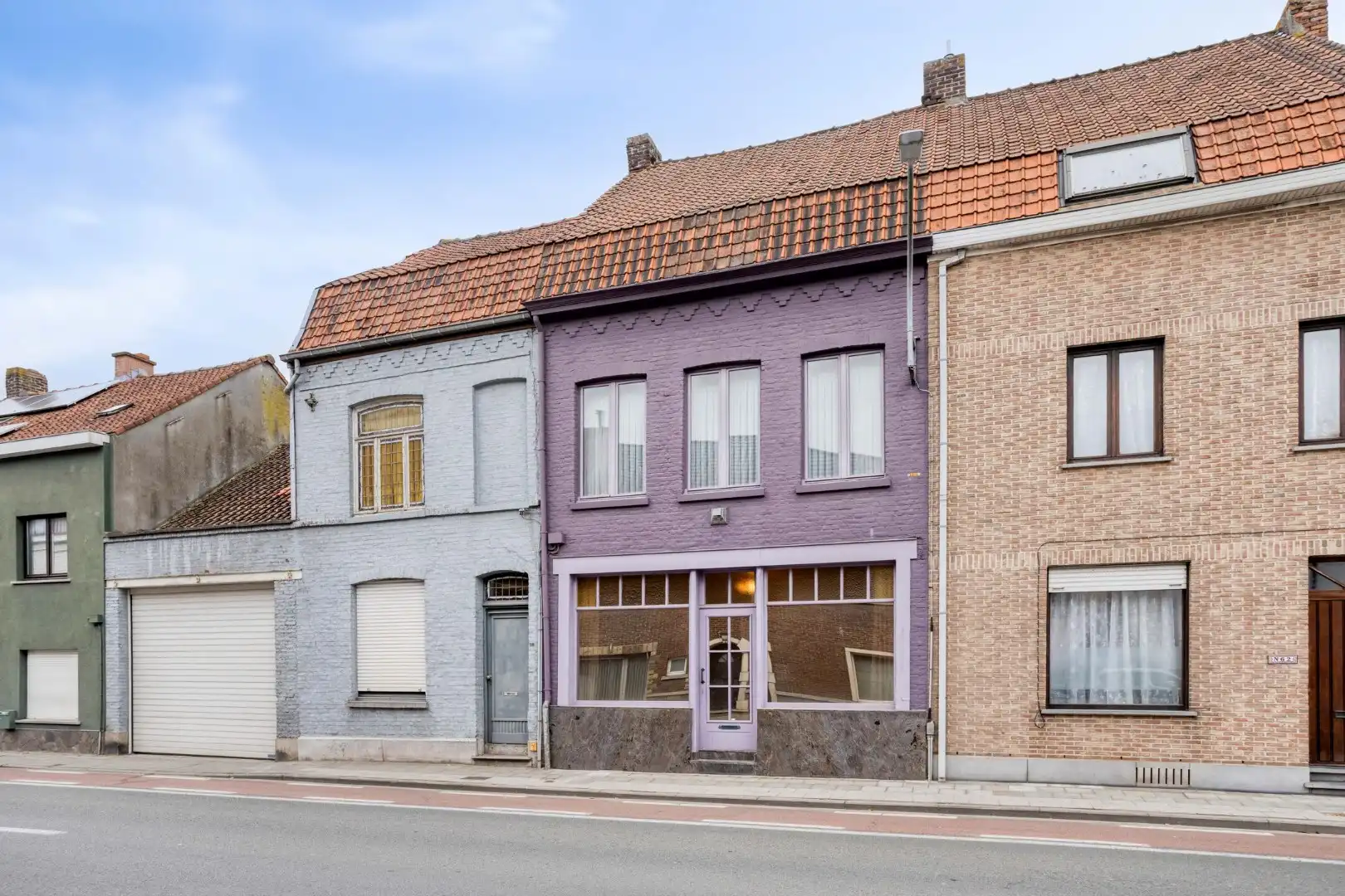 Te renoveren woning met tuin en garage in het centrum van Menen! foto 2