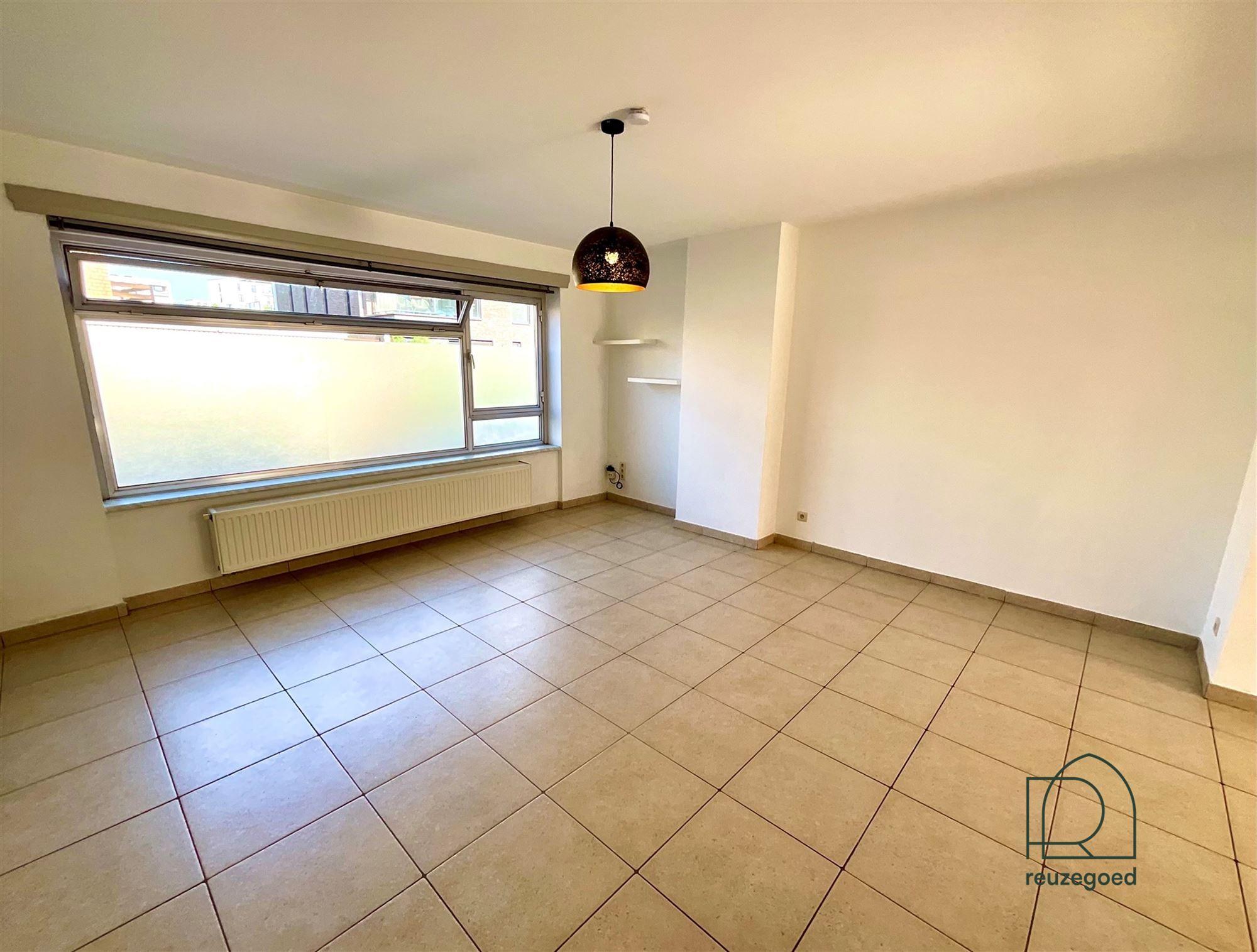 Gelijkvloers appartement met één slaapkamer en een leuke tuin op het zuidwesten, gelegen in Mechelen! foto 6