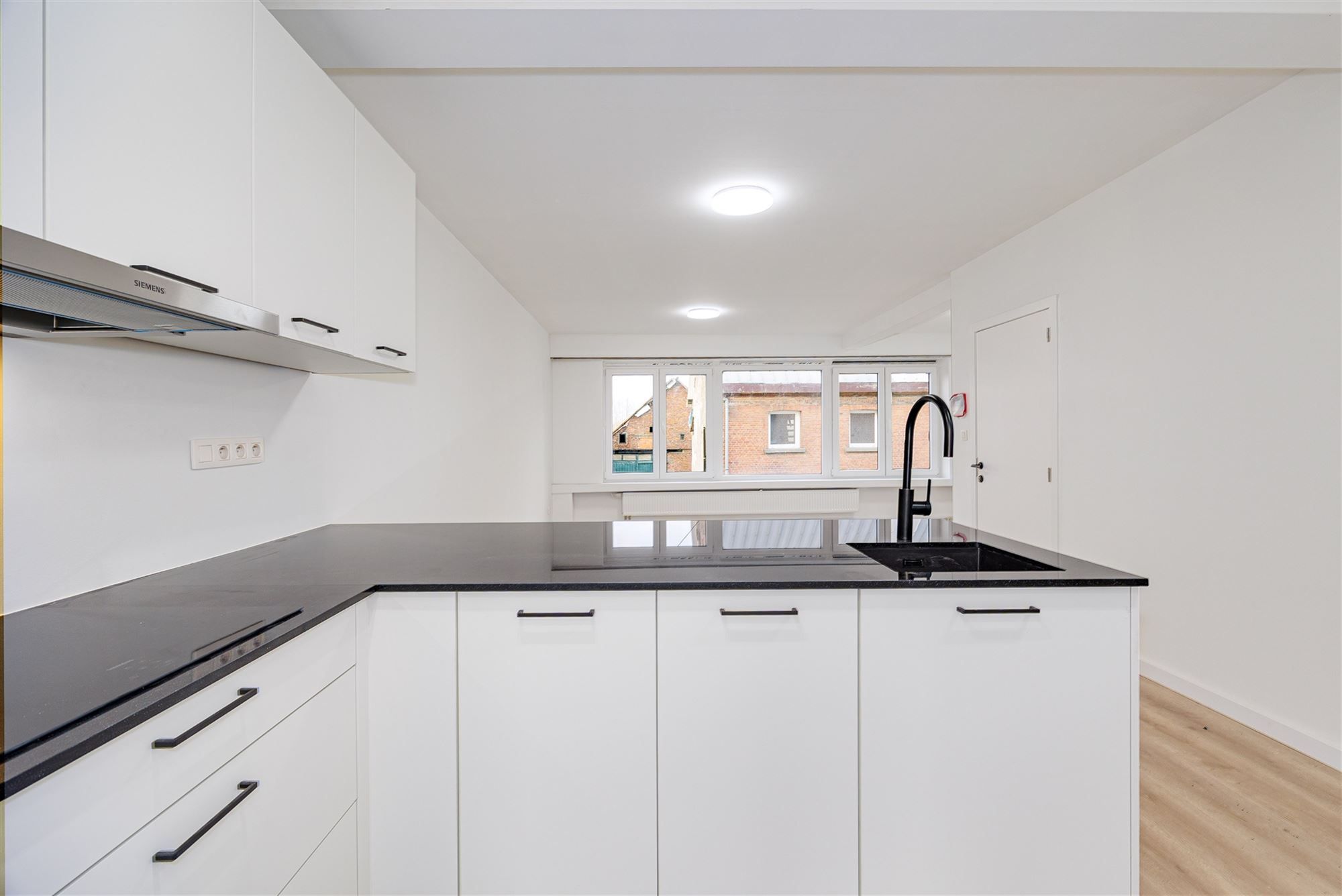 Instapklaar appartement met tuin en terras foto 4