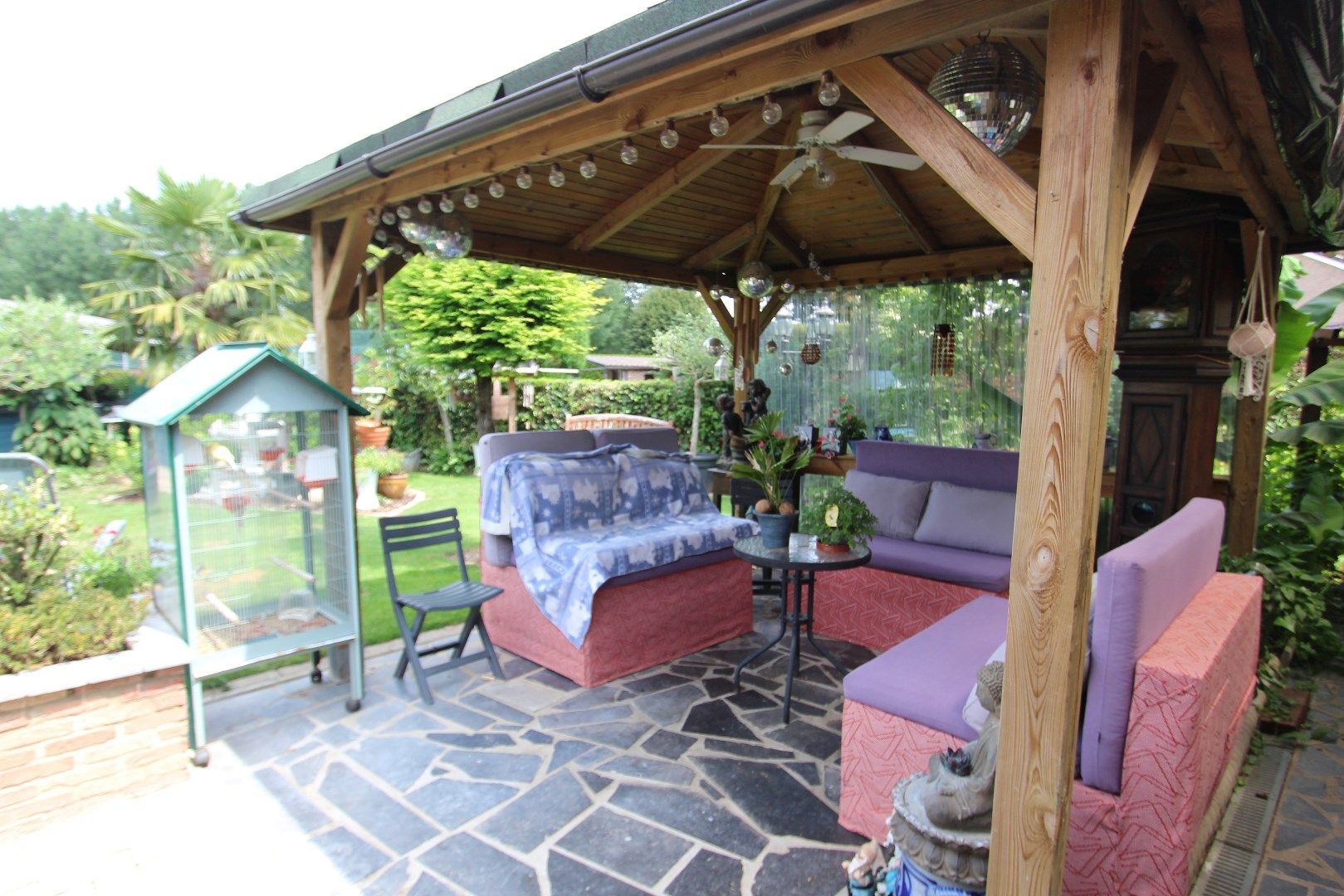 Charmante woning met veranda en mooie tuin in een rustige, landelijke omgeving foto 23