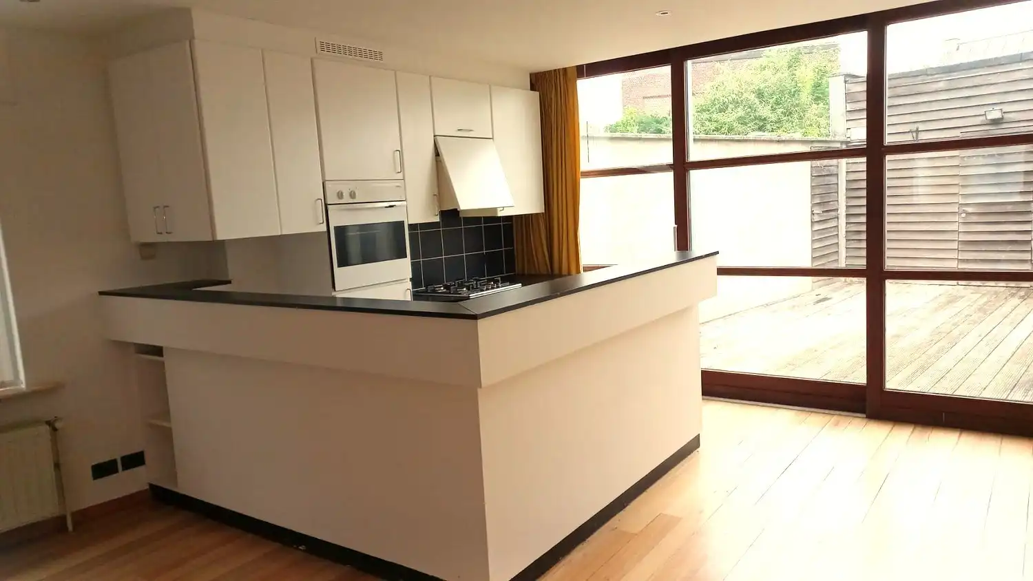 Hoofdfoto van de publicatie: Veelzijdige woning met verhuurpotentieel in het centrum van Asse