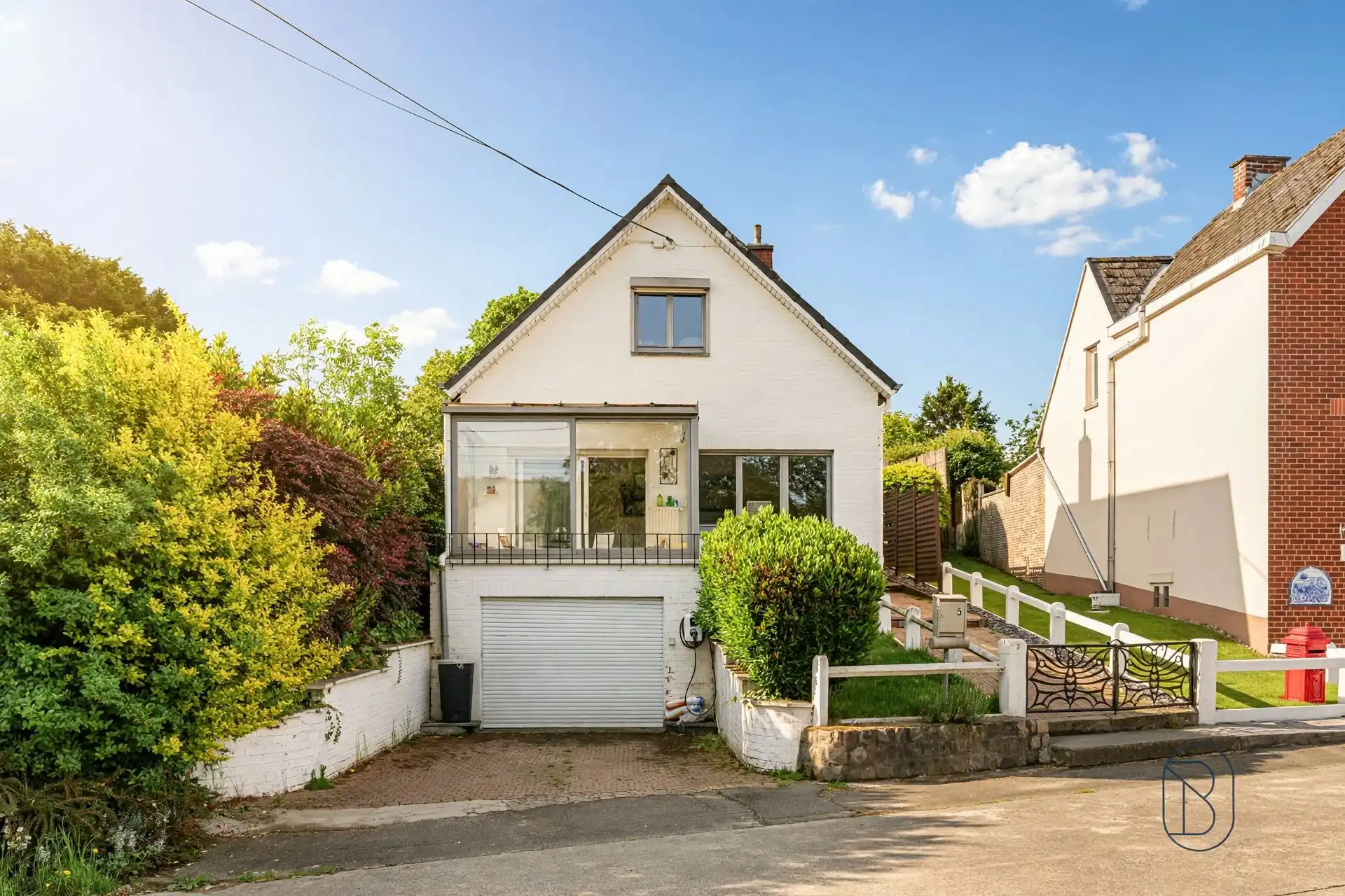 Bel-etagewoning met 3 slpk, garage en tuin in Vloesberg foto 3
