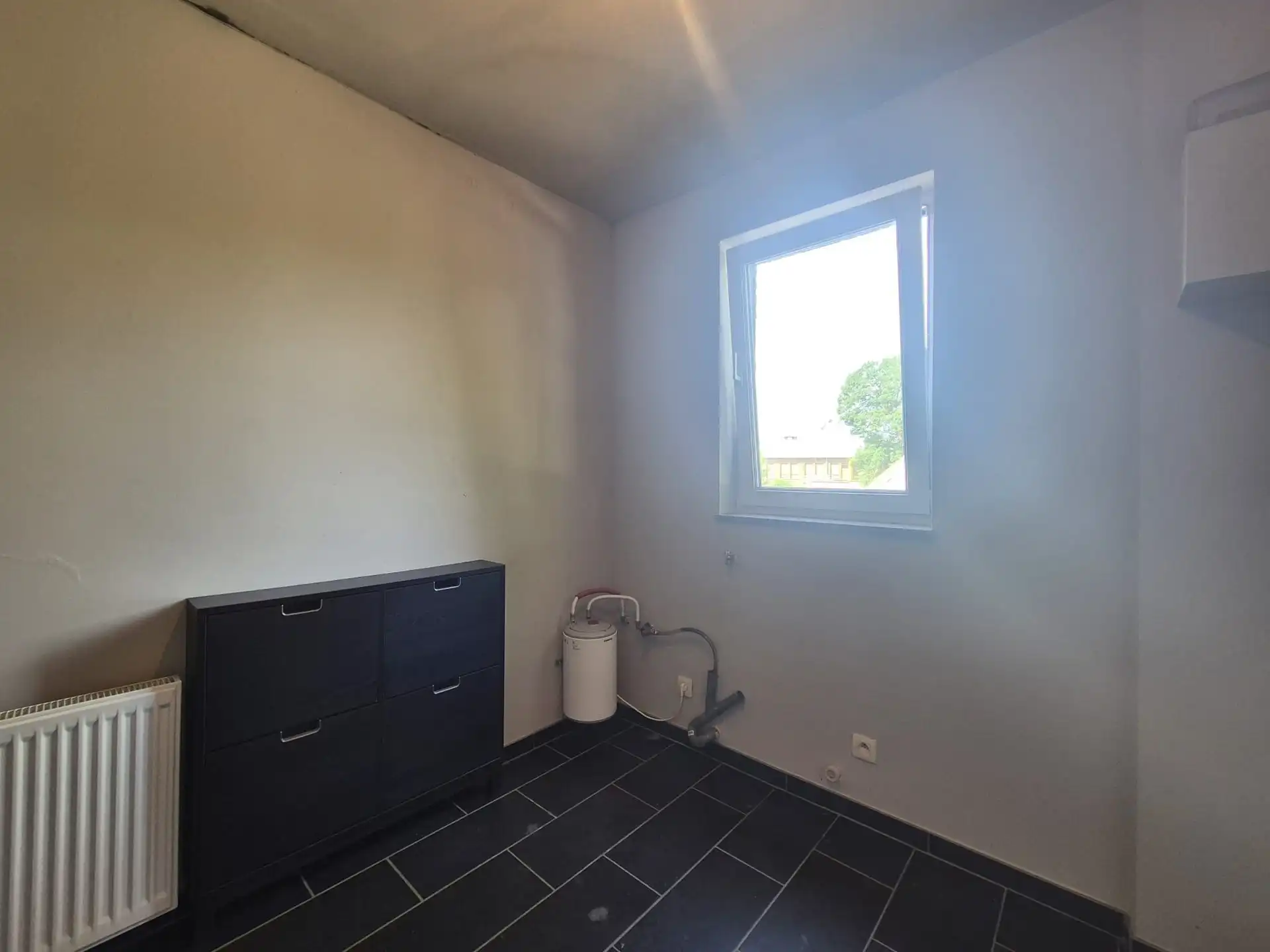 Instapklaar lichtrijk appartement met dakterras boven bakkerij “Hoste”. foto 16