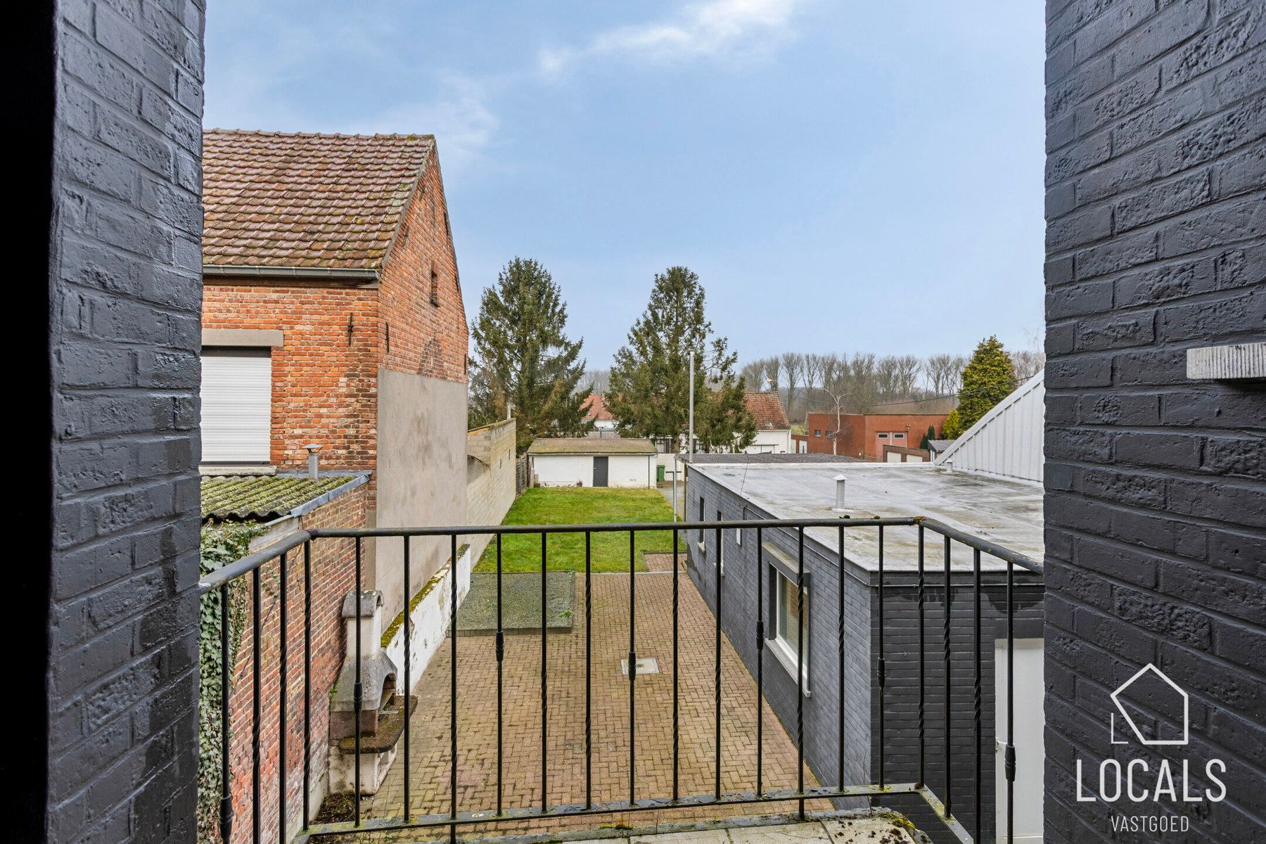 Veelzijdig pand: handelsruimte met woonst & parkeerplaatsen foto 12